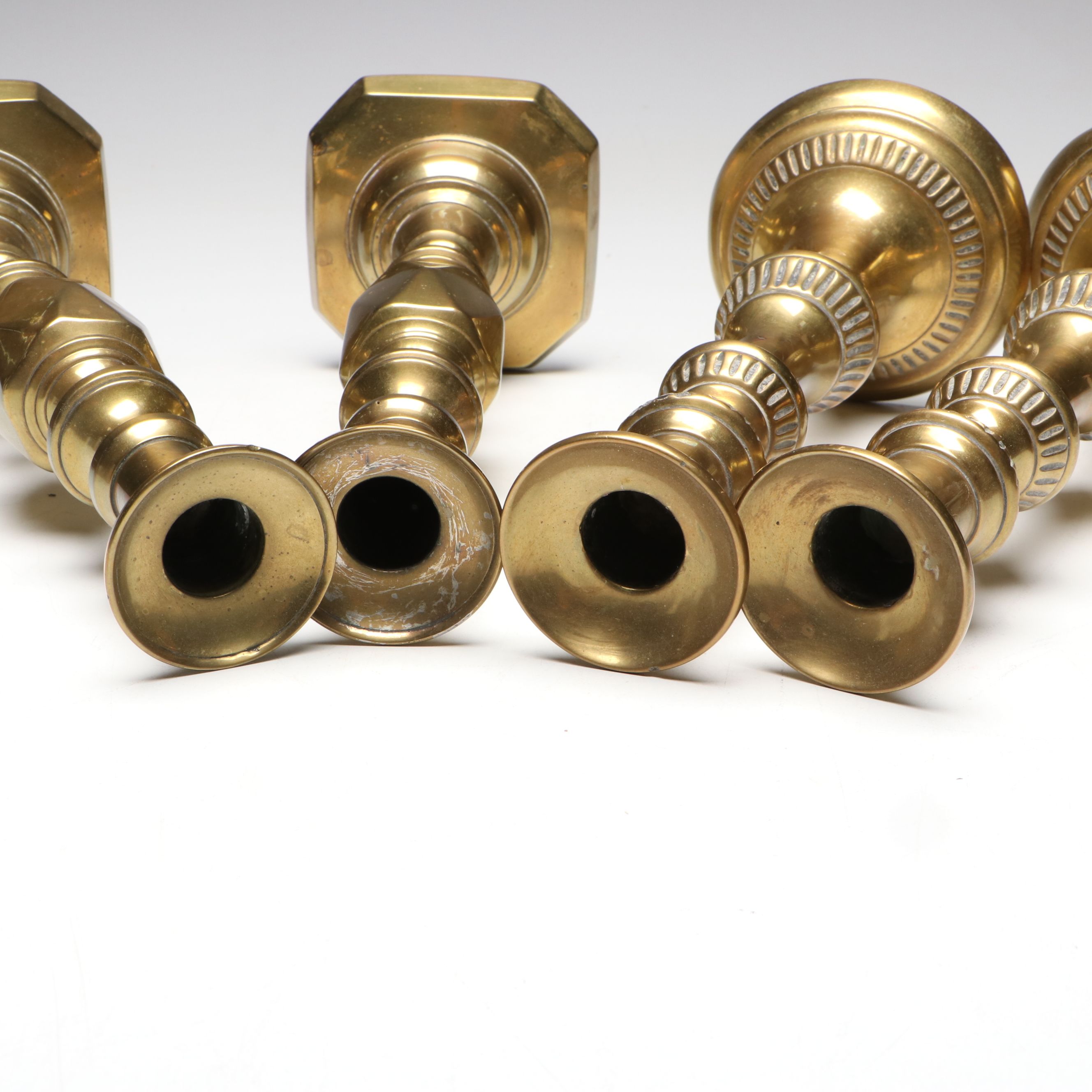 English Style "The Queen of Diamonds" with Other Brass Candlesticks