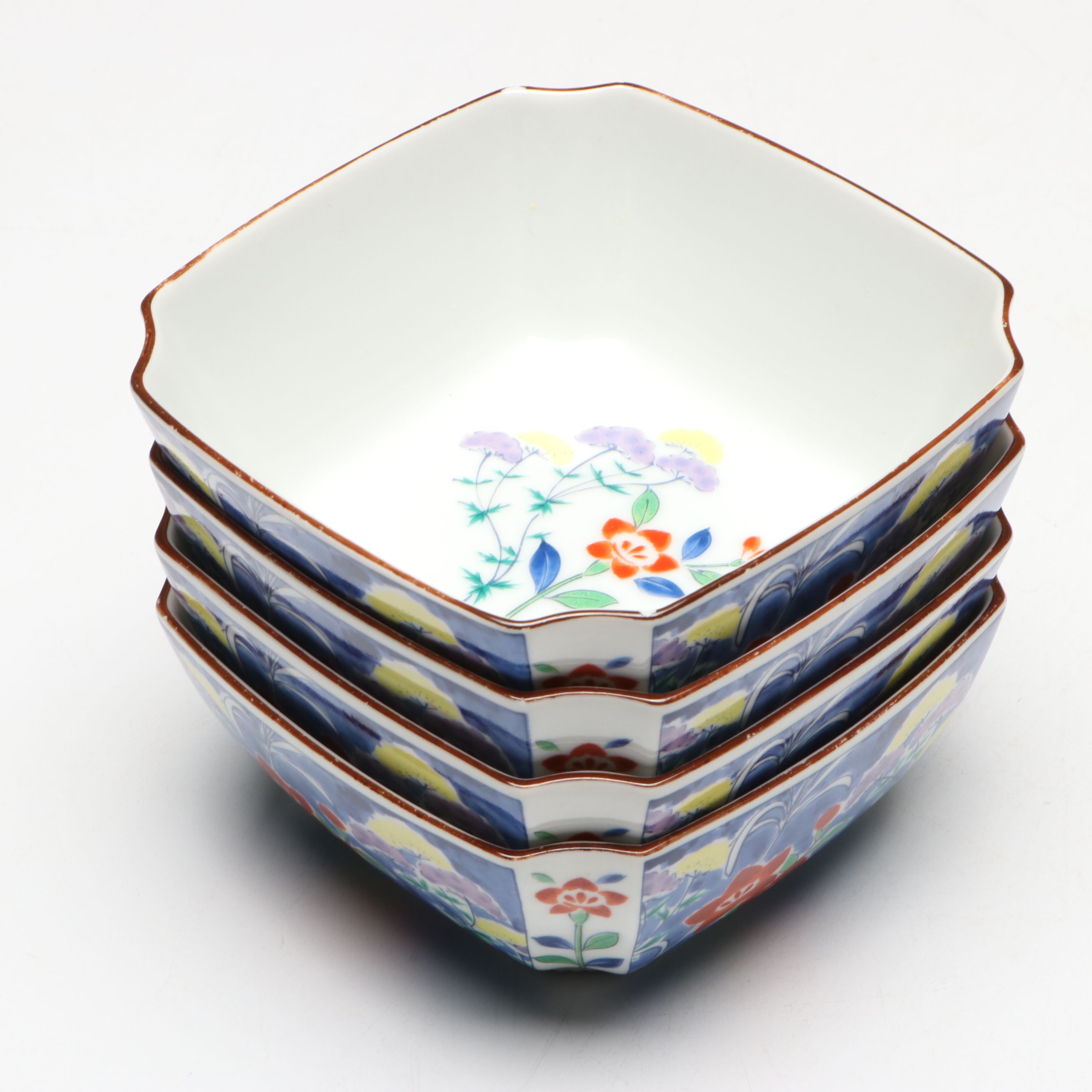 Kozan Gama and Other Japanese Porcelain Bowls with Floral and Radish Motifs
