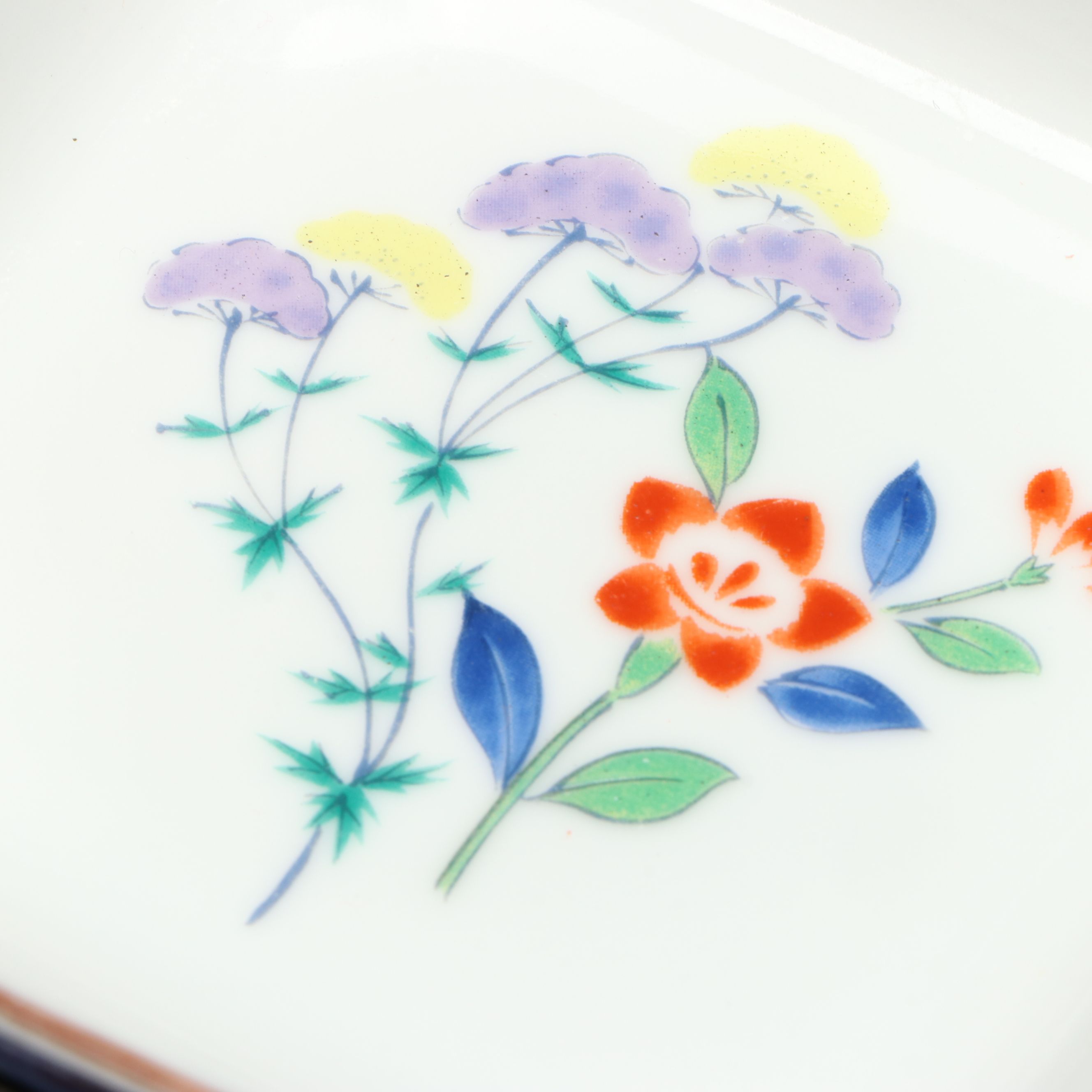 Kozan Gama and Other Japanese Porcelain Bowls with Floral and Radish Motifs