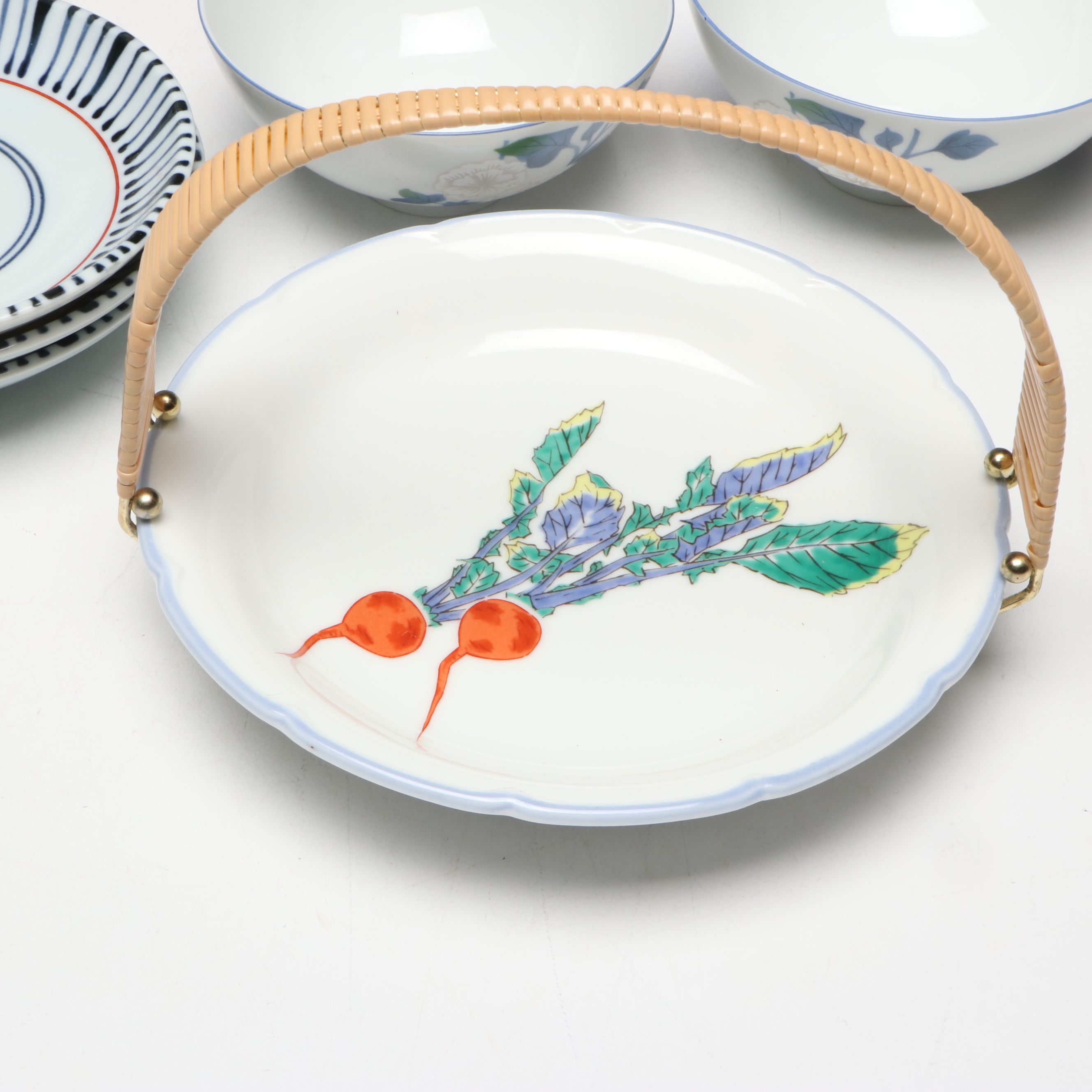 Kozan Gama and Other Japanese Porcelain Bowls with Floral and Radish Motifs