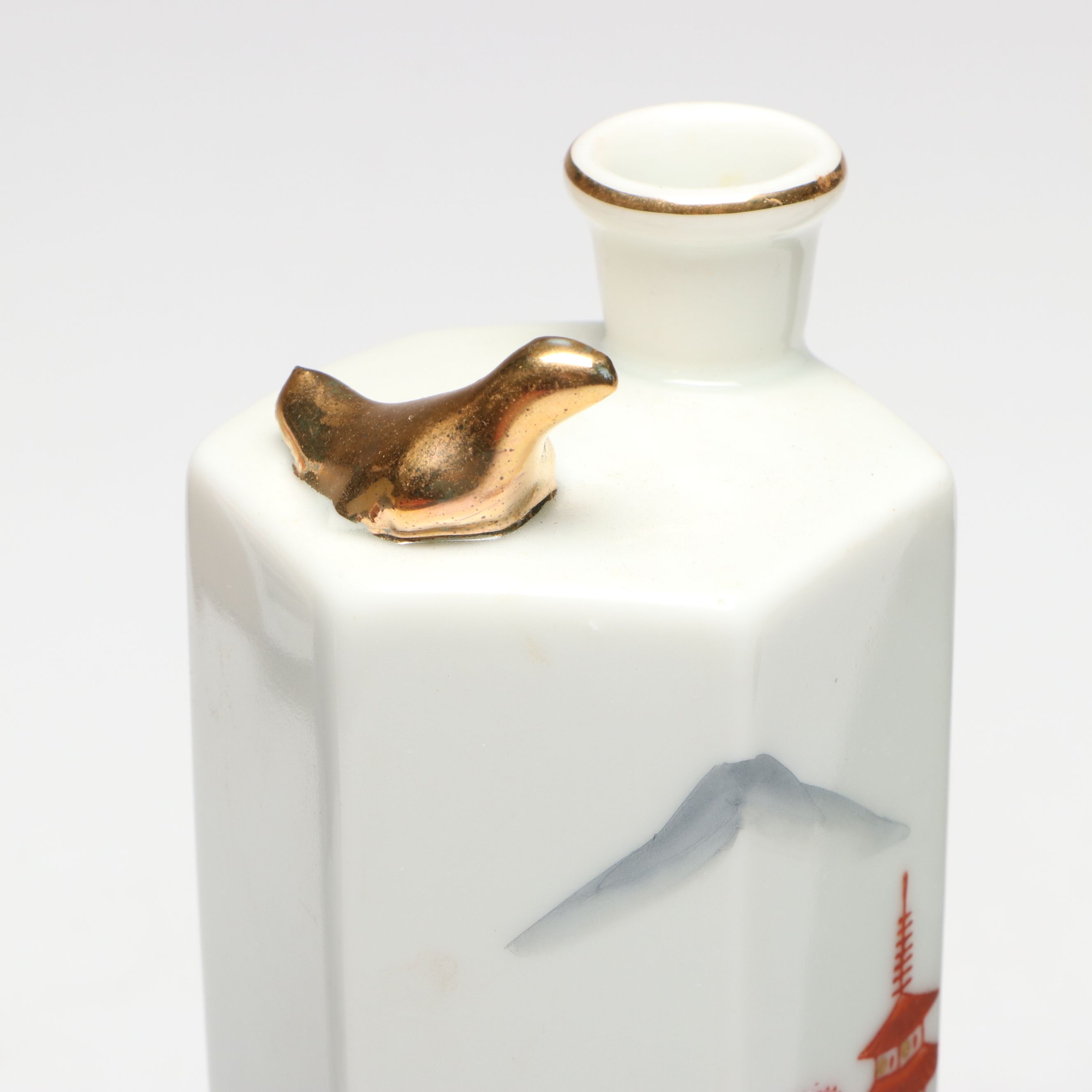 "Kamotsuru" Whistling Bird Porcelain Sake Bottle and Other Sake Carafes