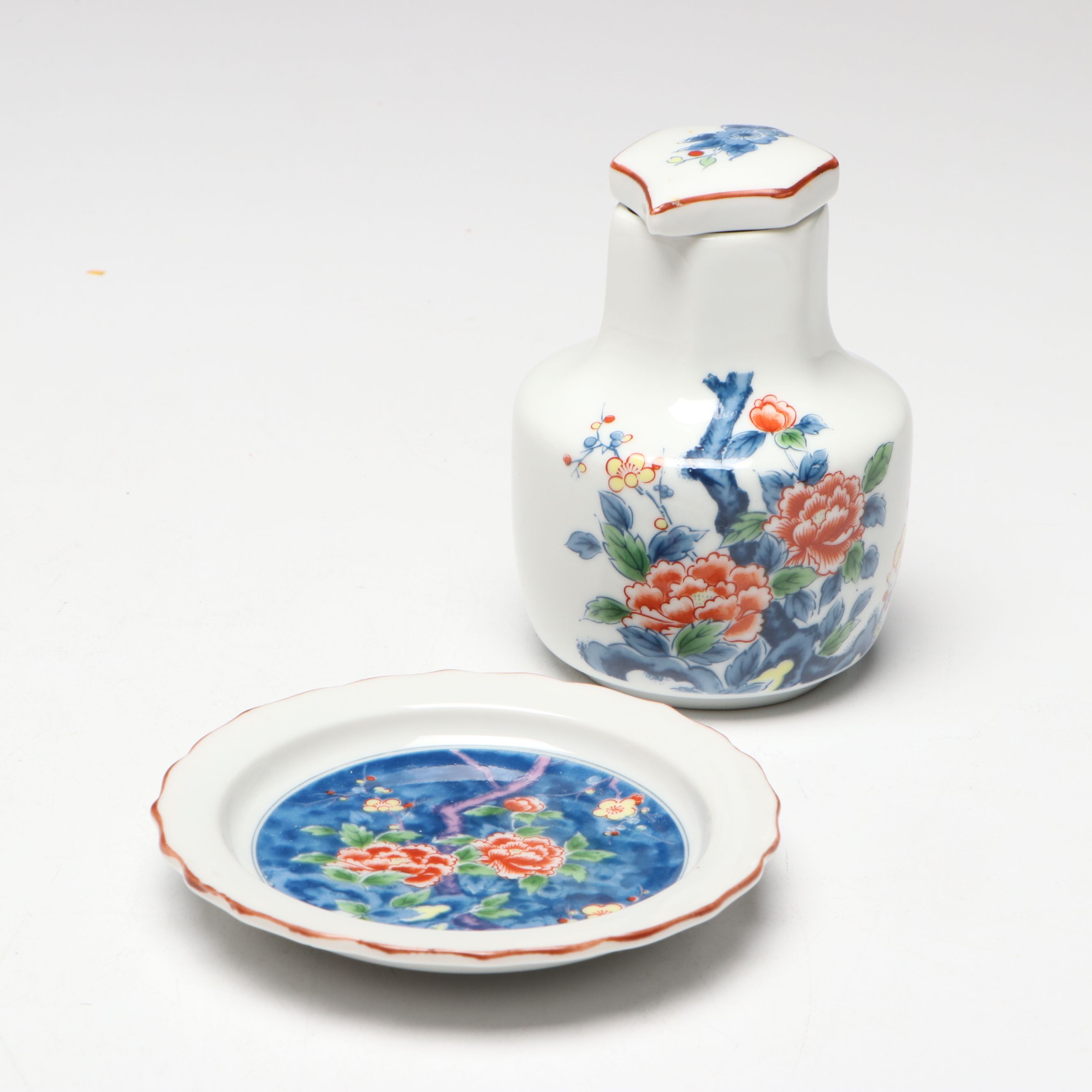 "Kamotsuru" Whistling Bird Porcelain Sake Bottle and Other Sake Carafes