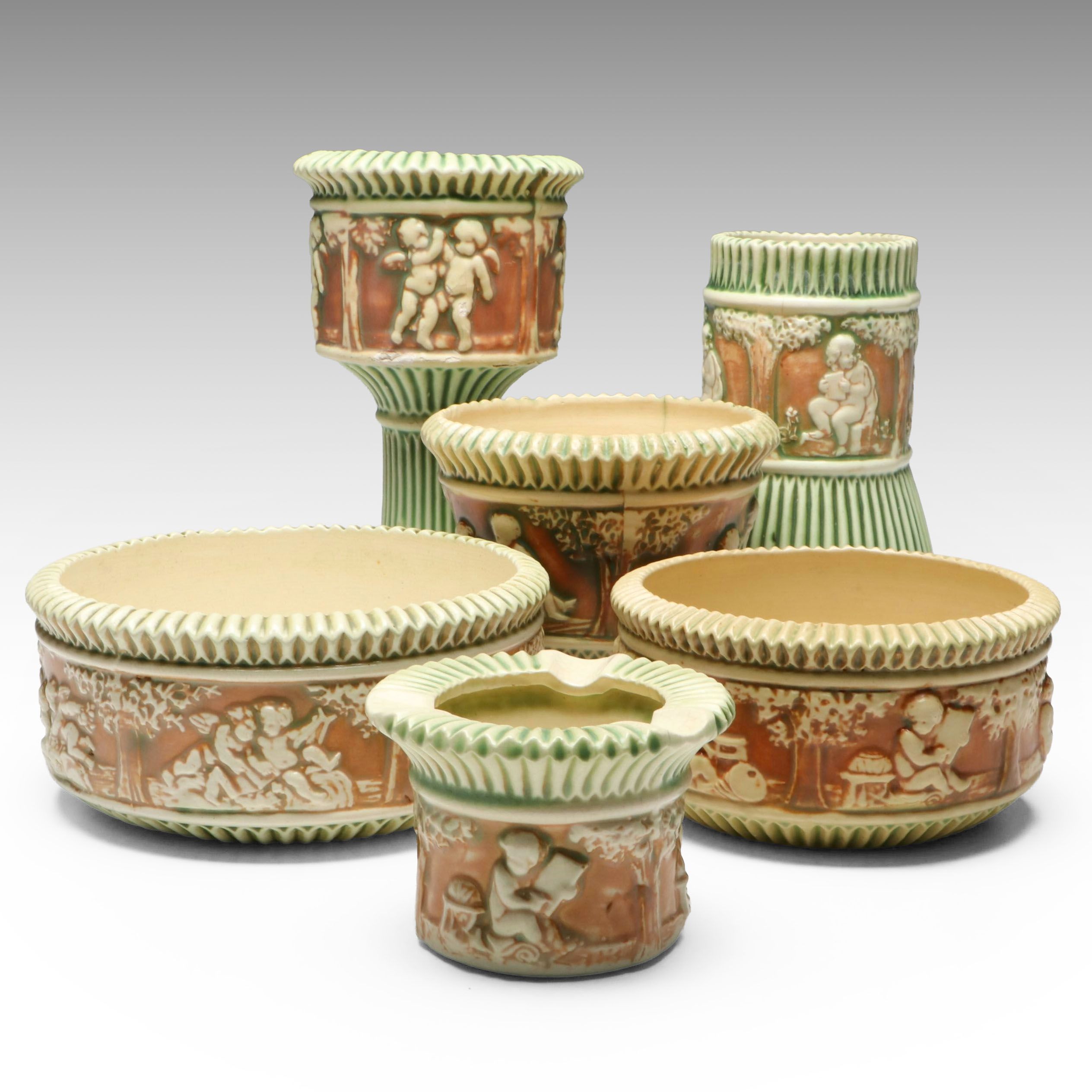 Roseville Pottery "Donatello" Ceramic Cherub Vases and Bowls, Early 20th Century