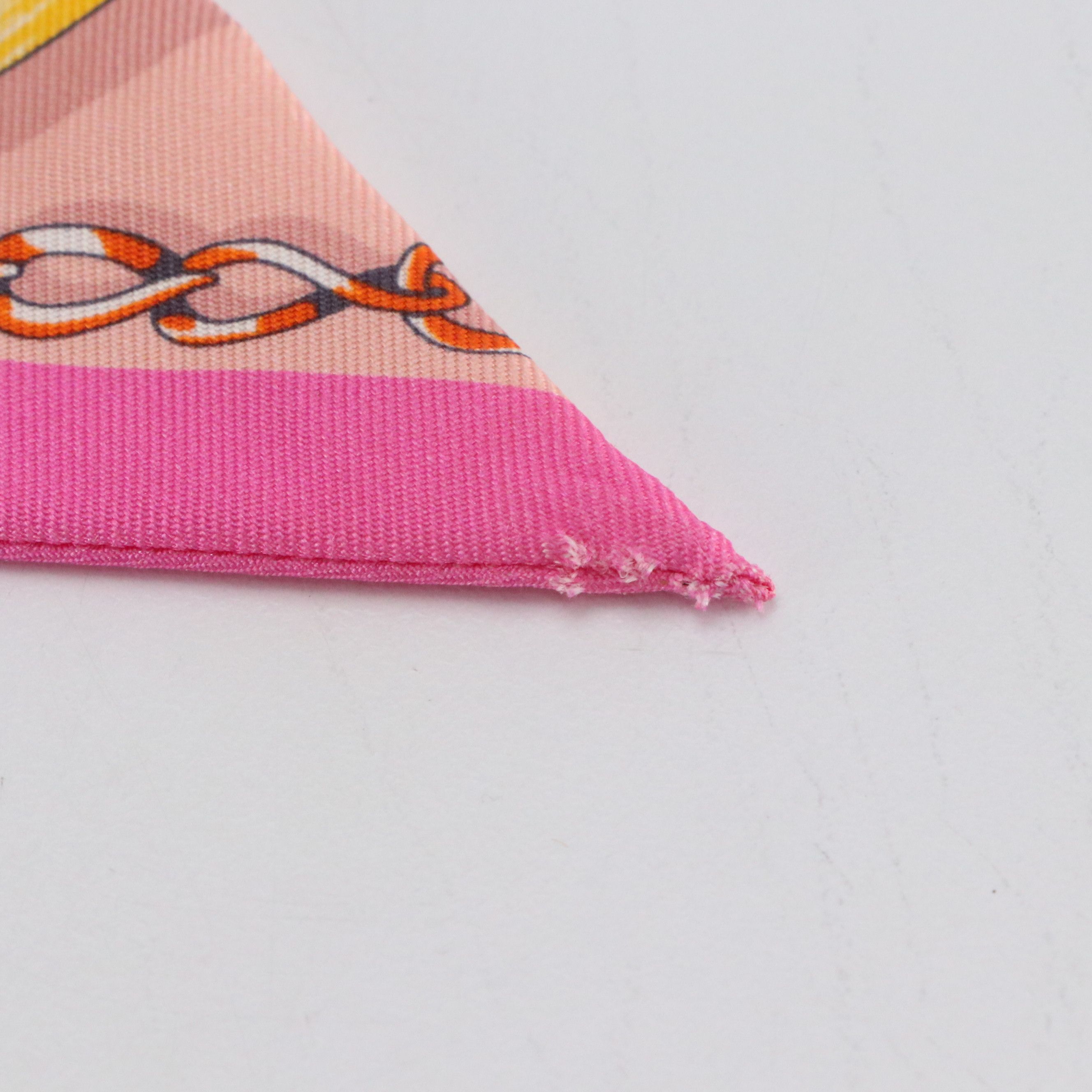 Hermès "Cavalcades" Silk Twilly in Pink Silk