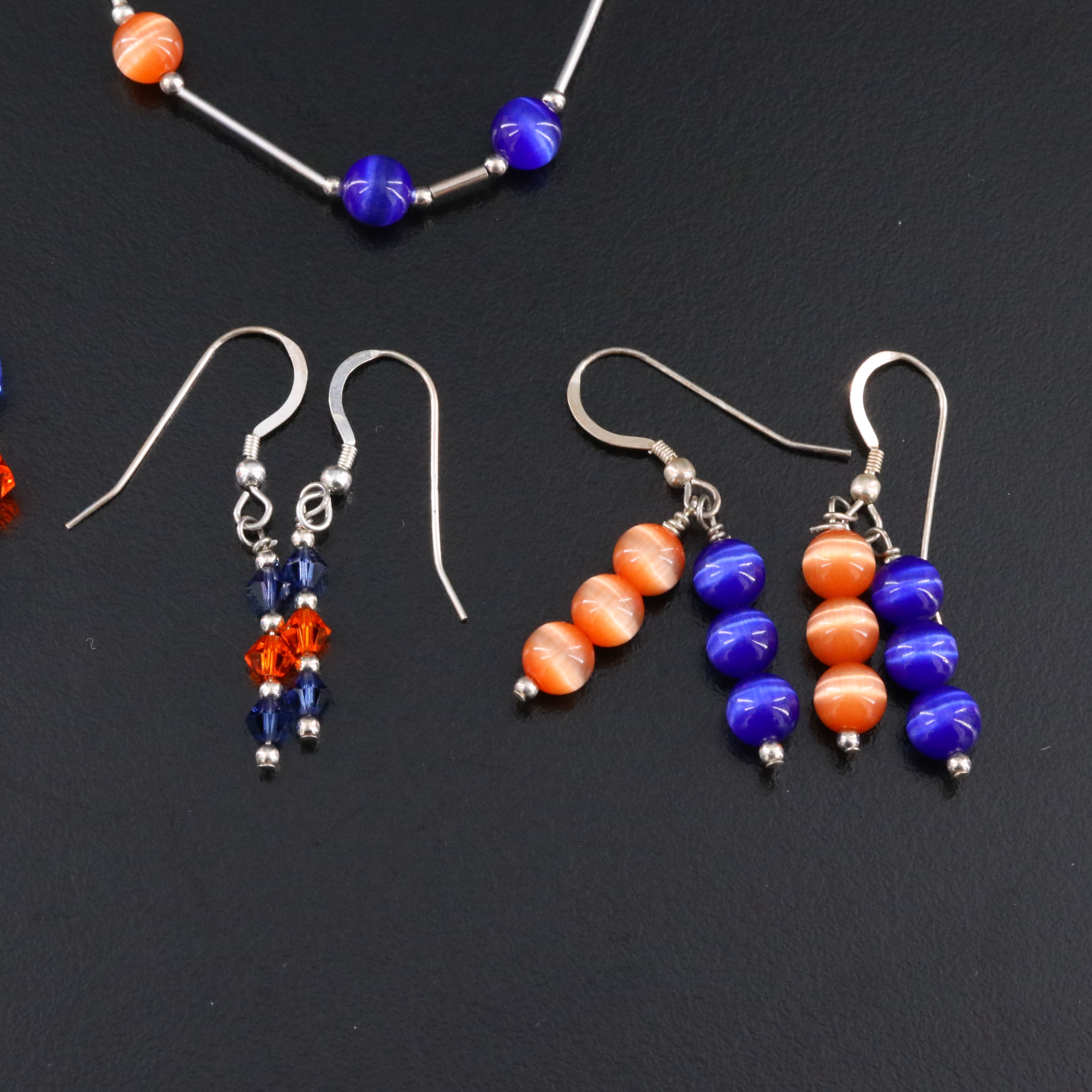 Sterling Bead Necklaces, Bracelets, and Earrings Featuring Cat's Eye Glass