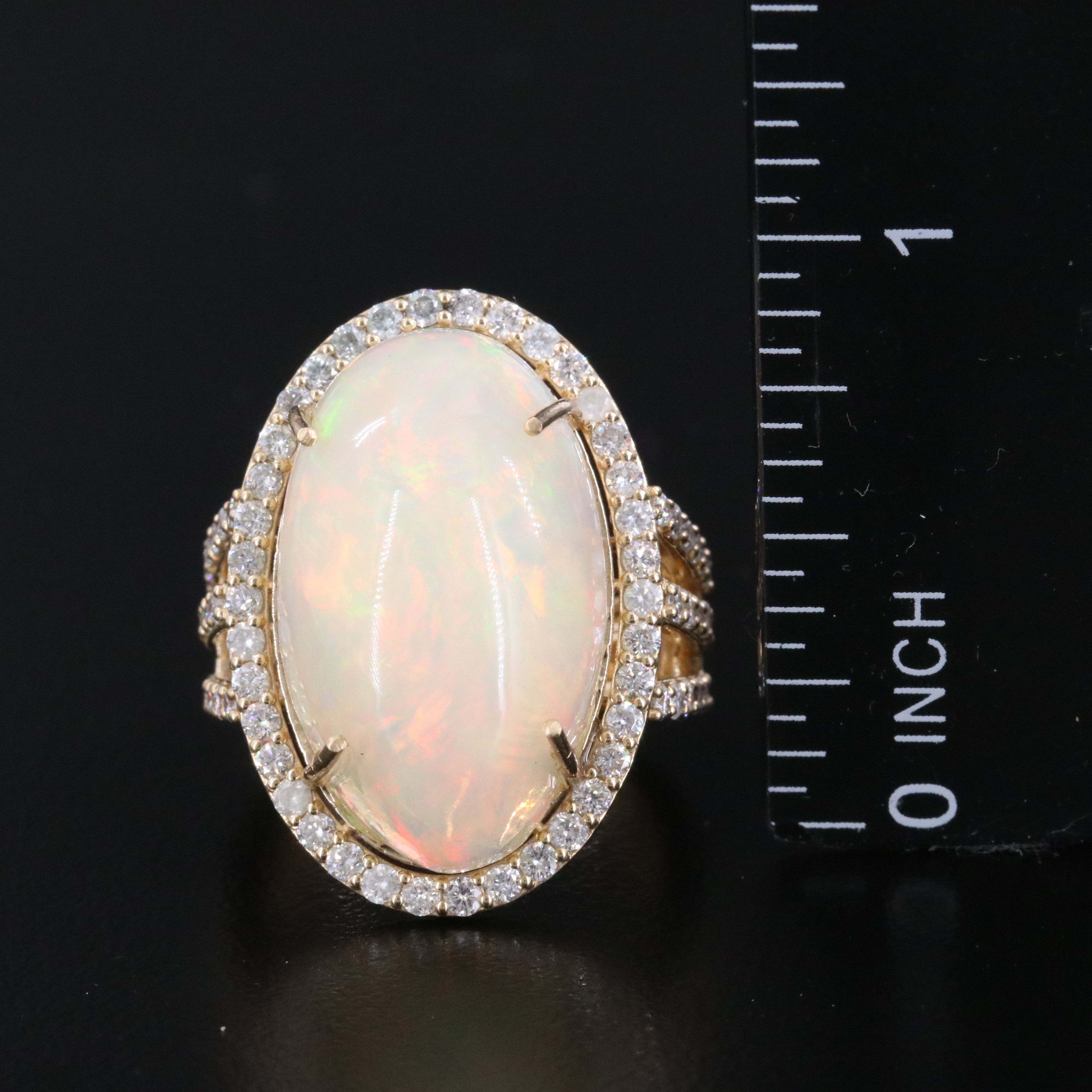 14K 11.46 CTW Opal Ring with 1.11 CTW Diamond Halo and Accents