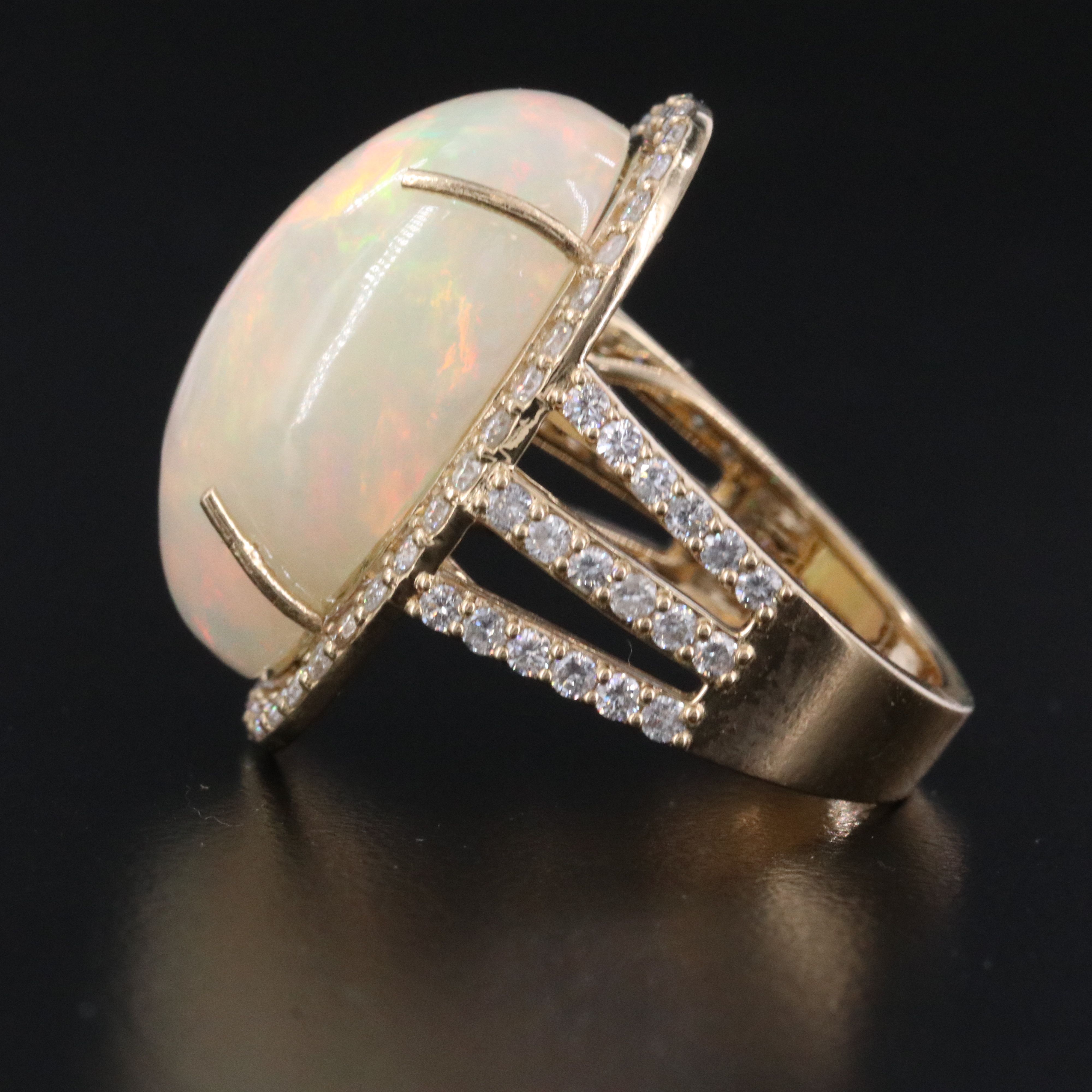 14K 11.46 CTW Opal Ring with 1.11 CTW Diamond Halo and Accents