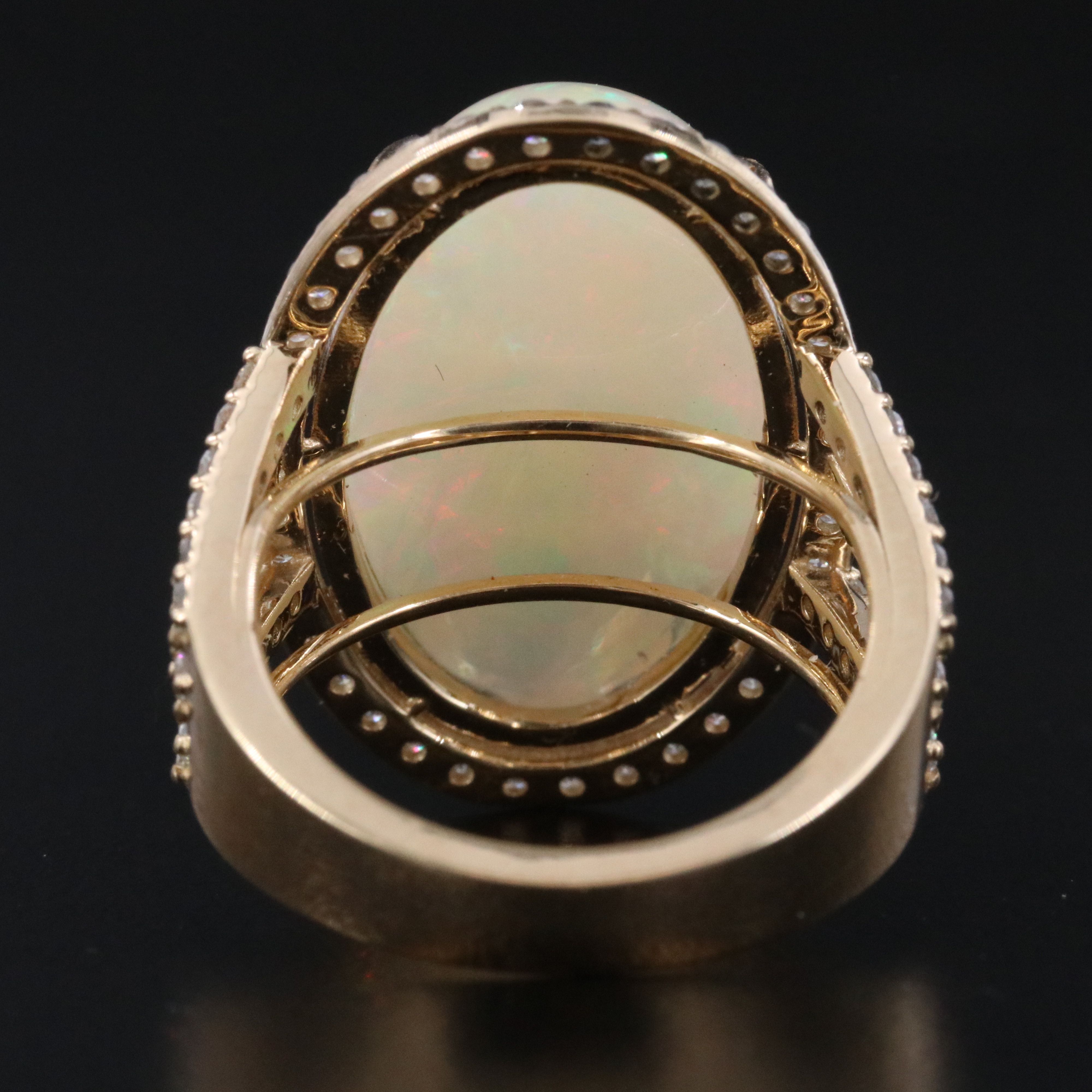14K 11.46 CTW Opal Ring with 1.11 CTW Diamond Halo and Accents