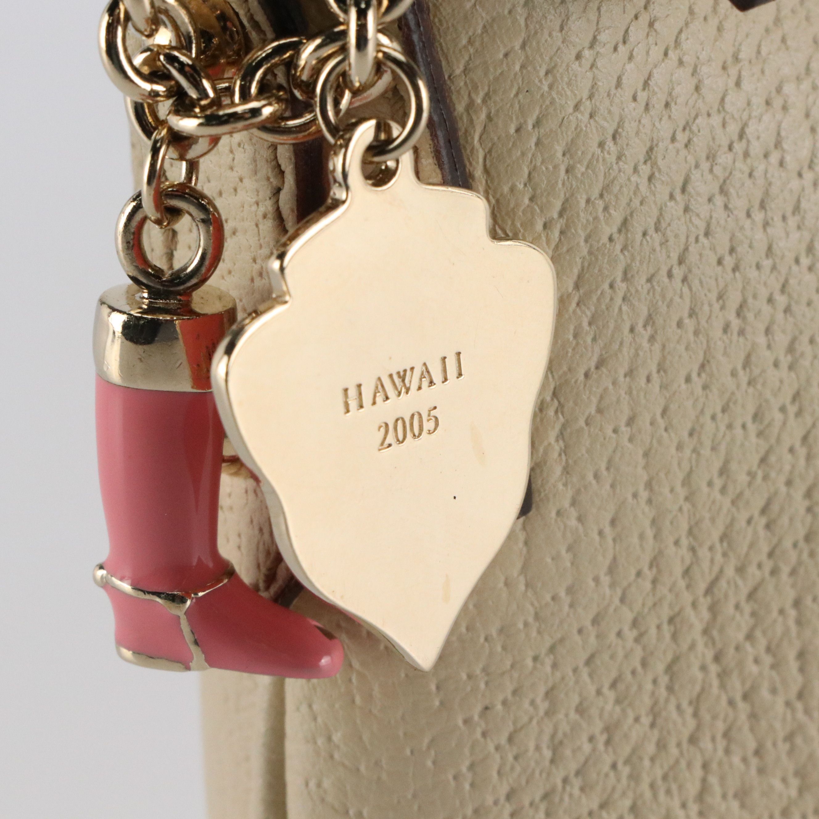 Gucci Pochette Bag in Ivory Leather with Pink Charms