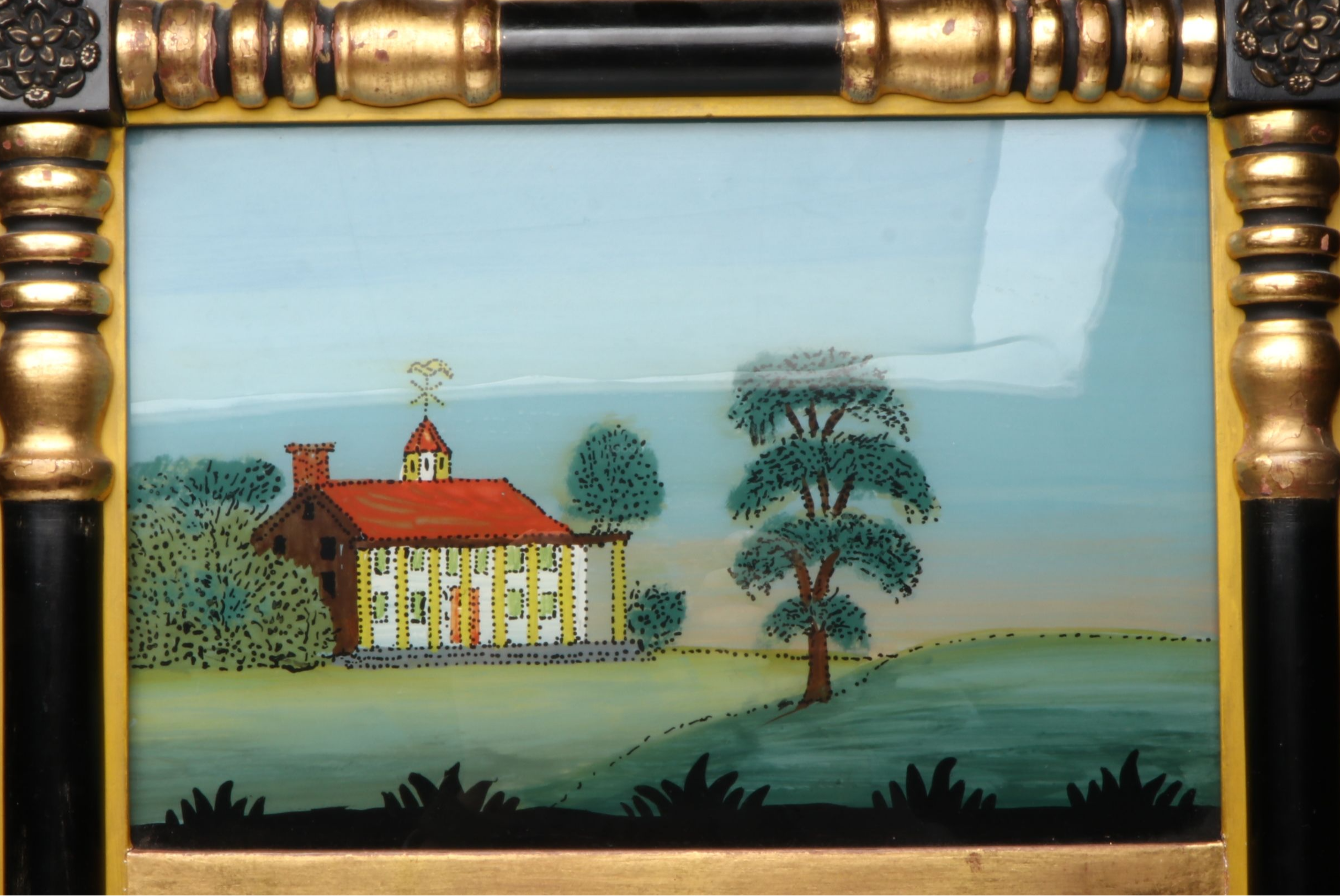 Empire Style Reverse Painted Ebonized and Gilt Wall Mirror