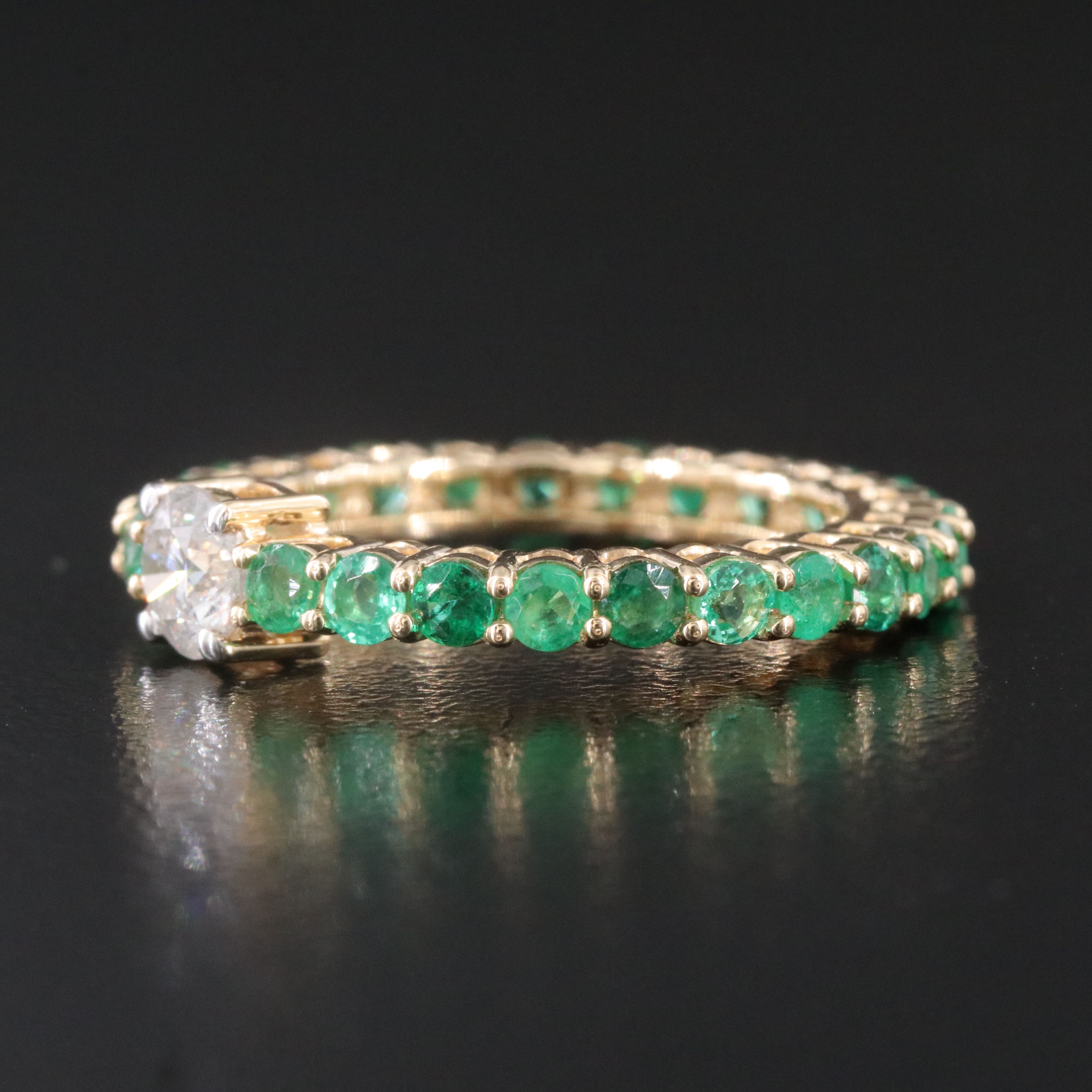 18K 1.48 CTW Emerald and 0.48 CTW Diamond Eternity Band