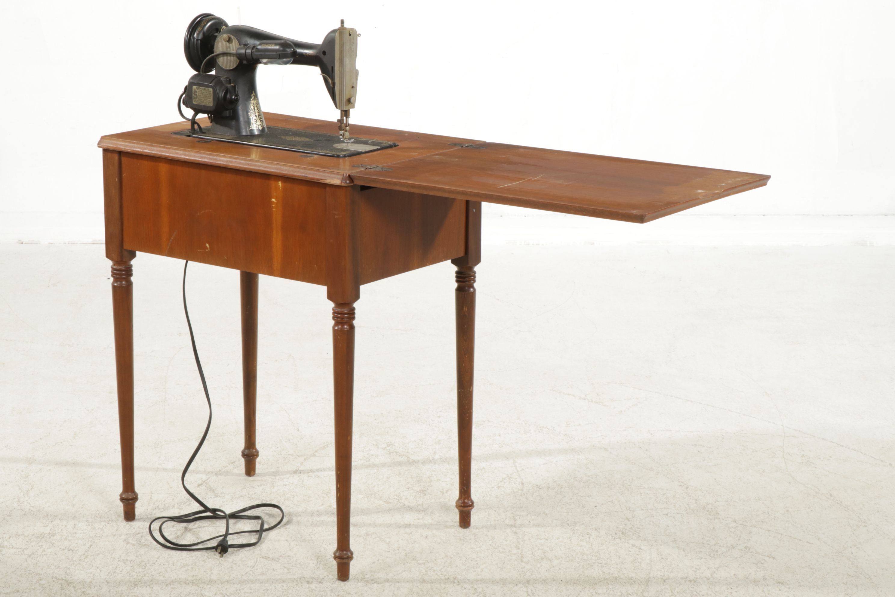 Singer Sewing Machine Model 66 in Drop Leaf Table Cabinet