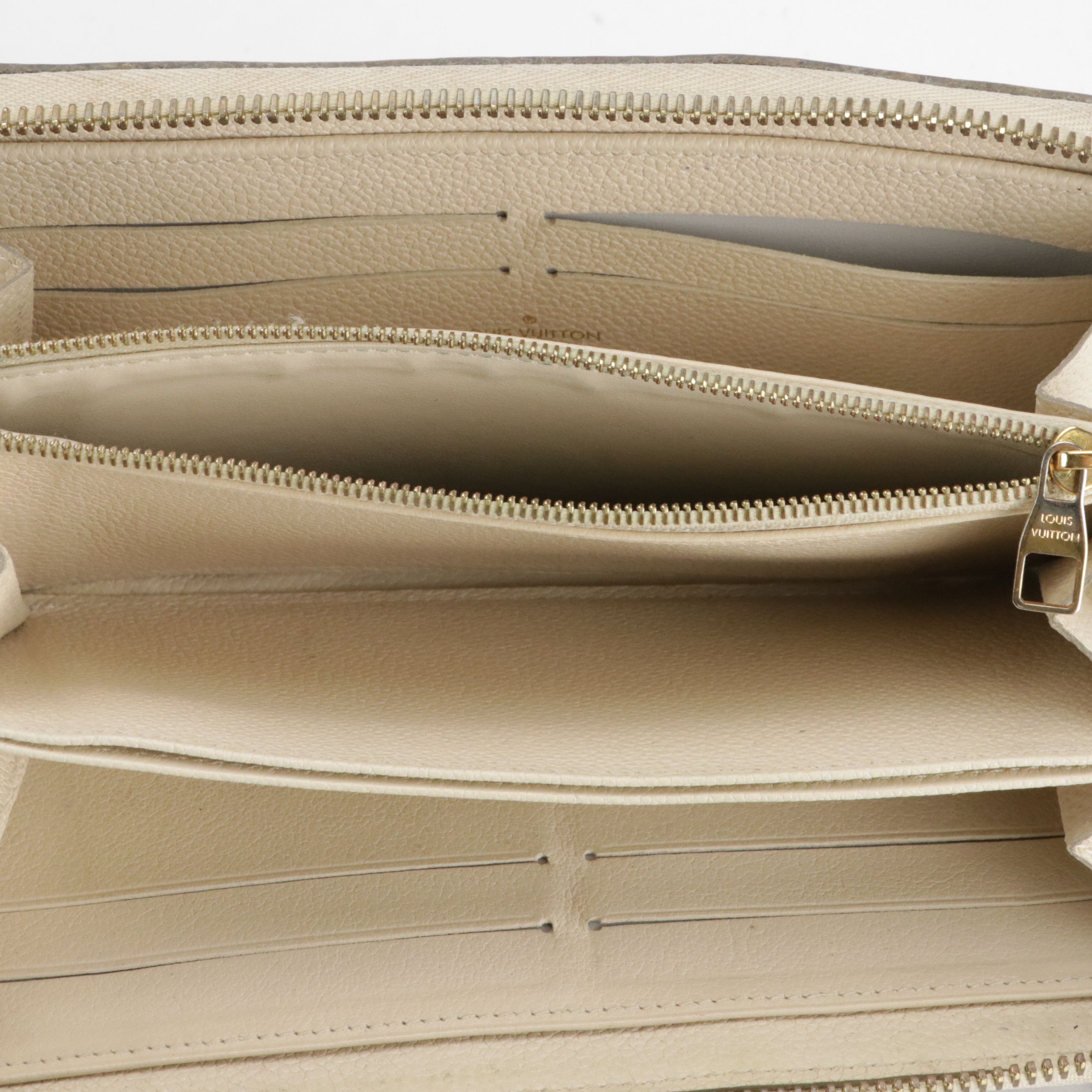 Louis Vuitton Zippy Wallet in Neige Monogram Empreinte Leather