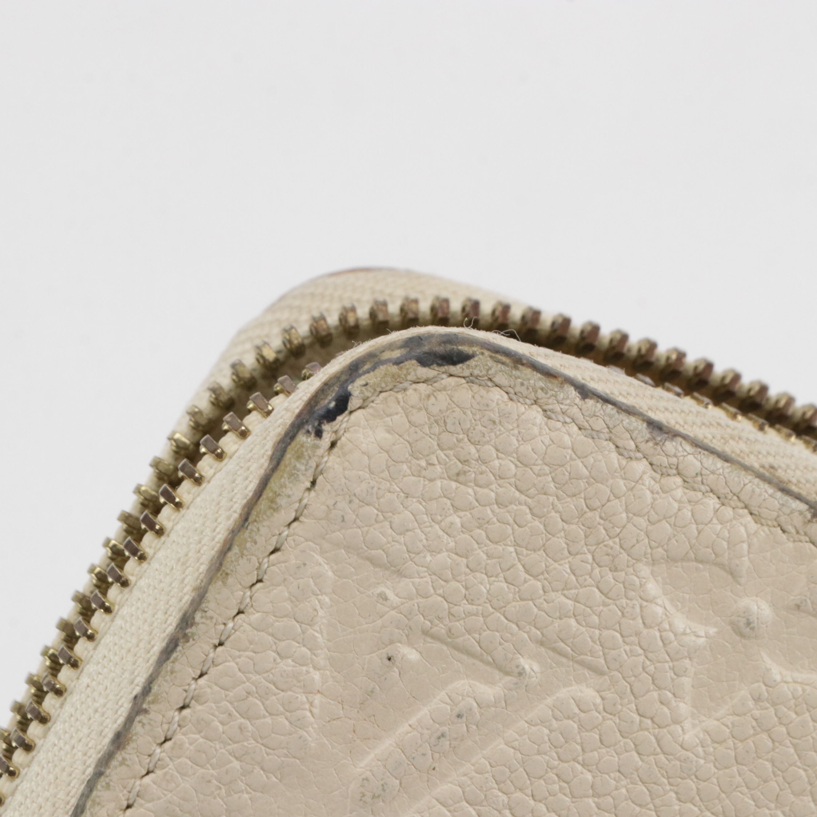 Louis Vuitton Zippy Wallet in Neige Monogram Empreinte Leather