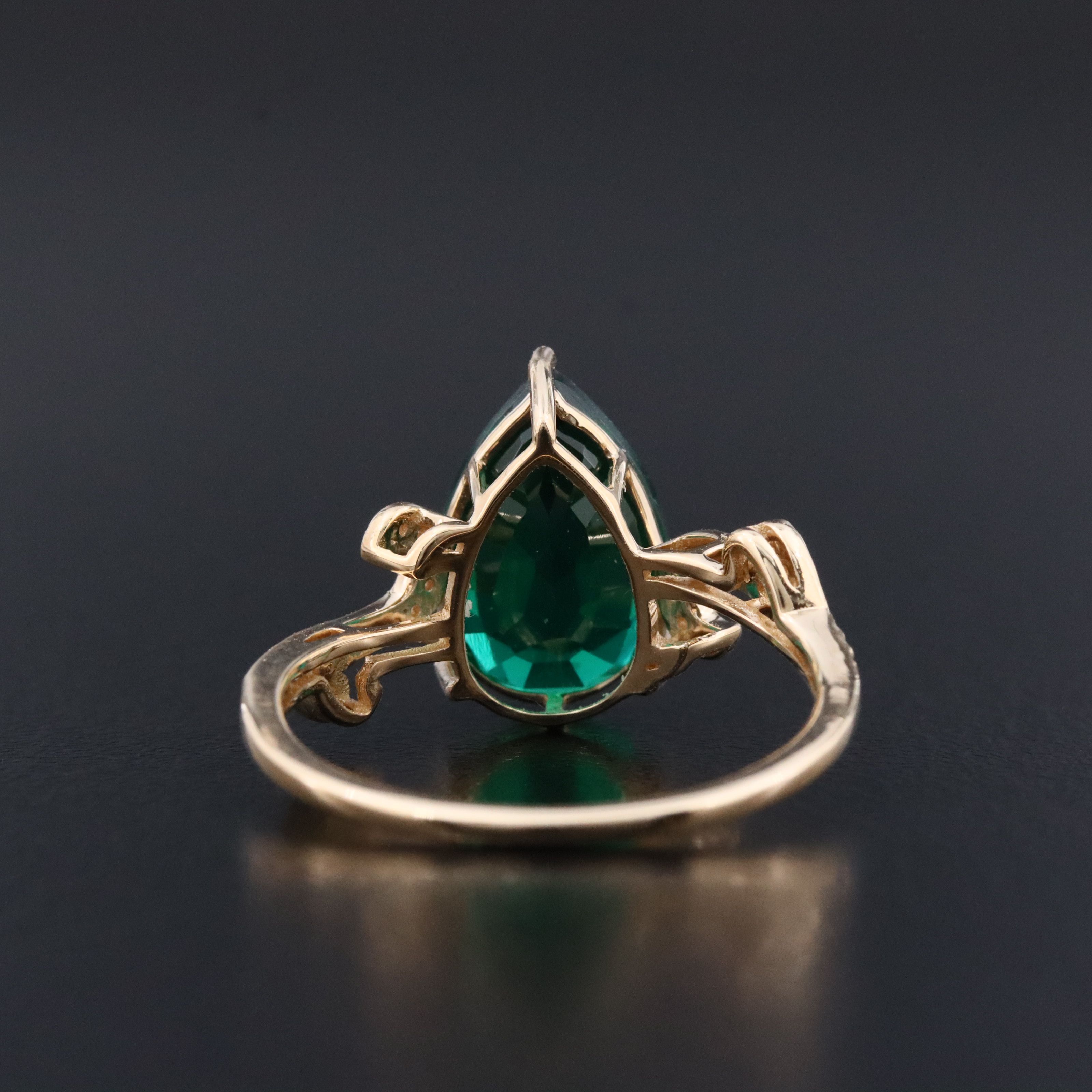 14K 2.61 CT Lab Grown Emerald and Moissanite Ring