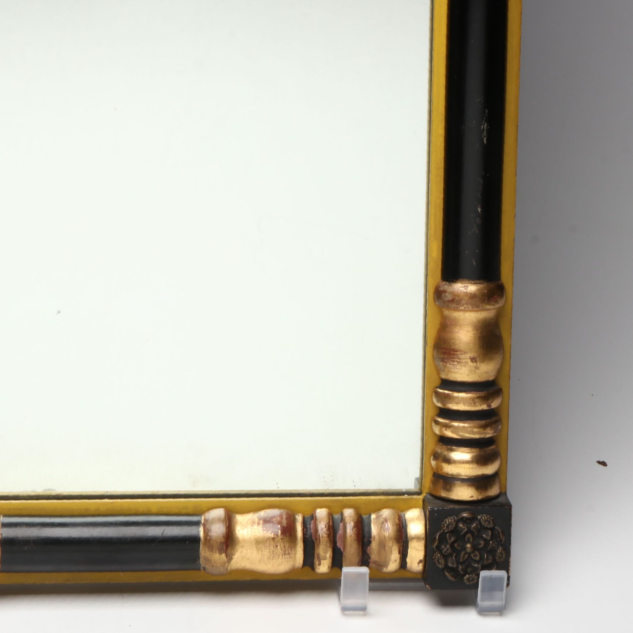 Empire Style Reverse Painted Ebonized and Gilt Wall Mirror