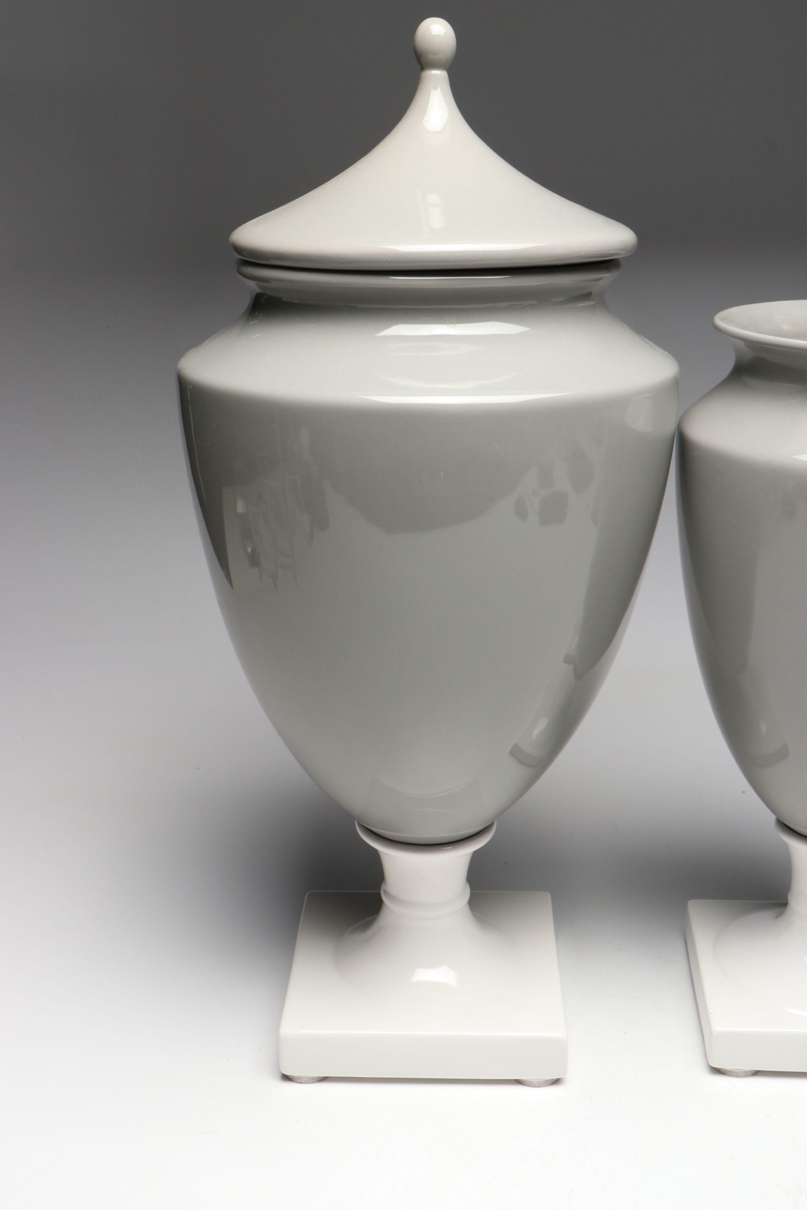 Gray and White Ceramic Urn and Vases