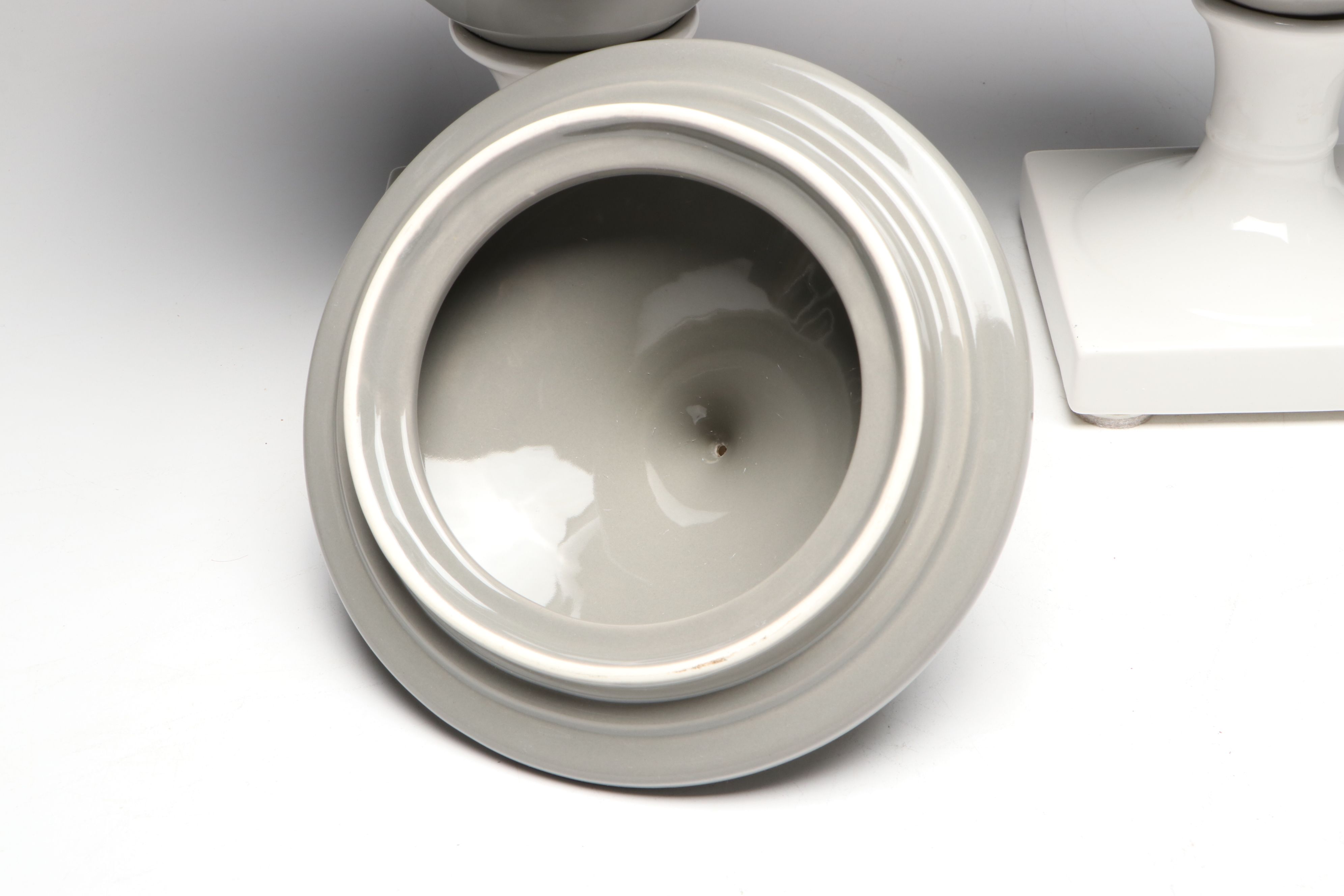 Gray and White Ceramic Urn and Vases