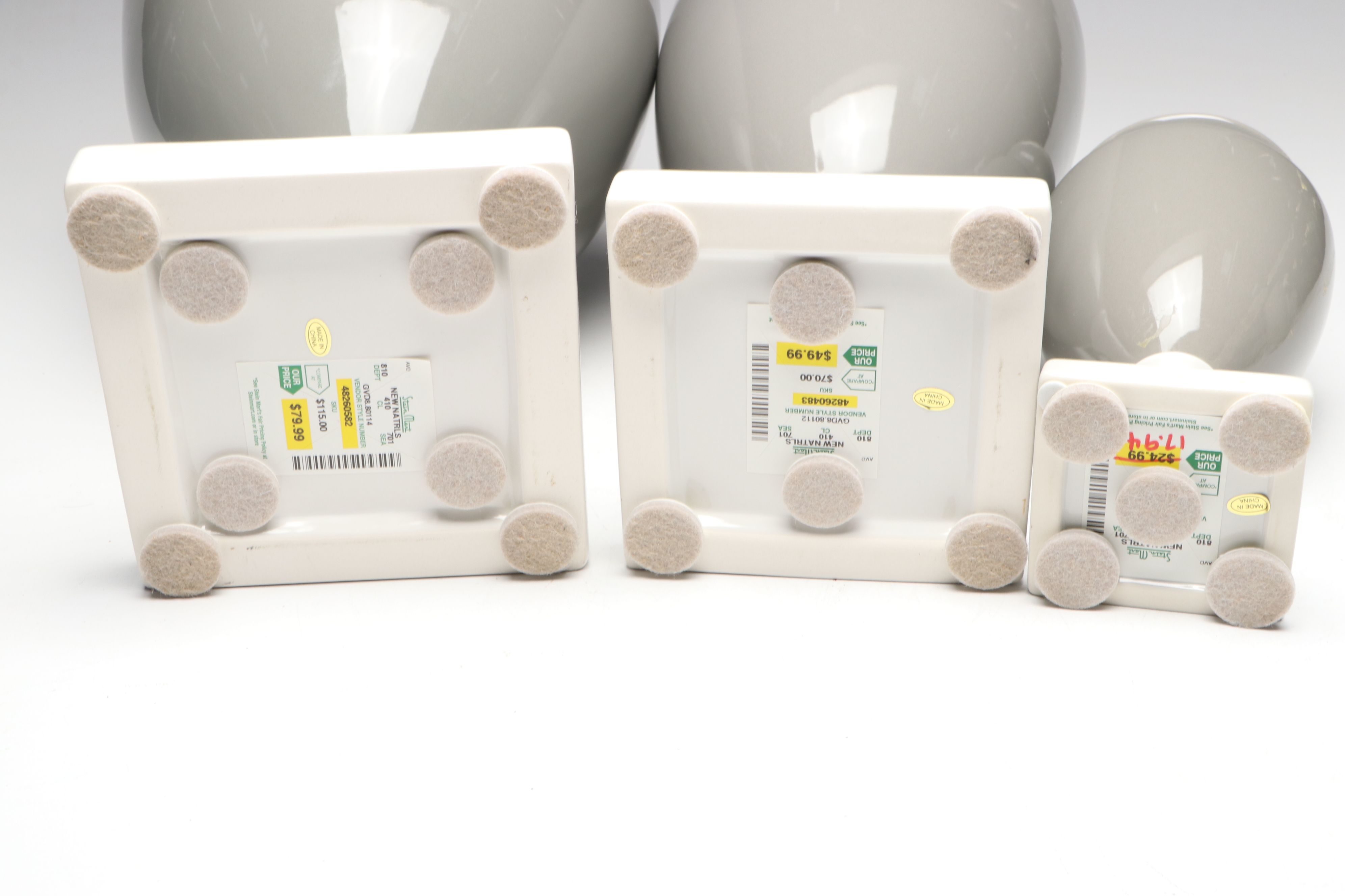 Gray and White Ceramic Urn and Vases