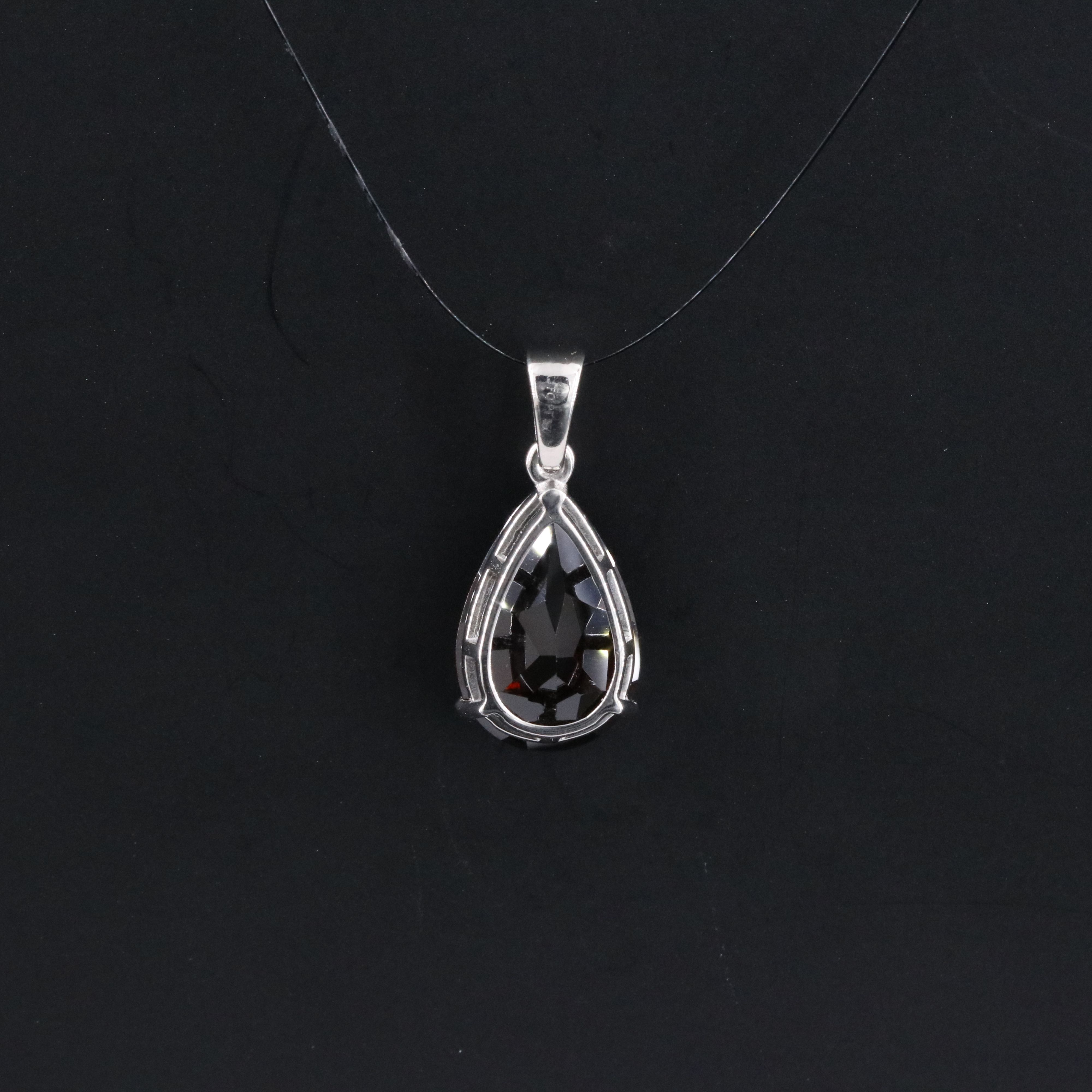 Platinum Garnet Pendant