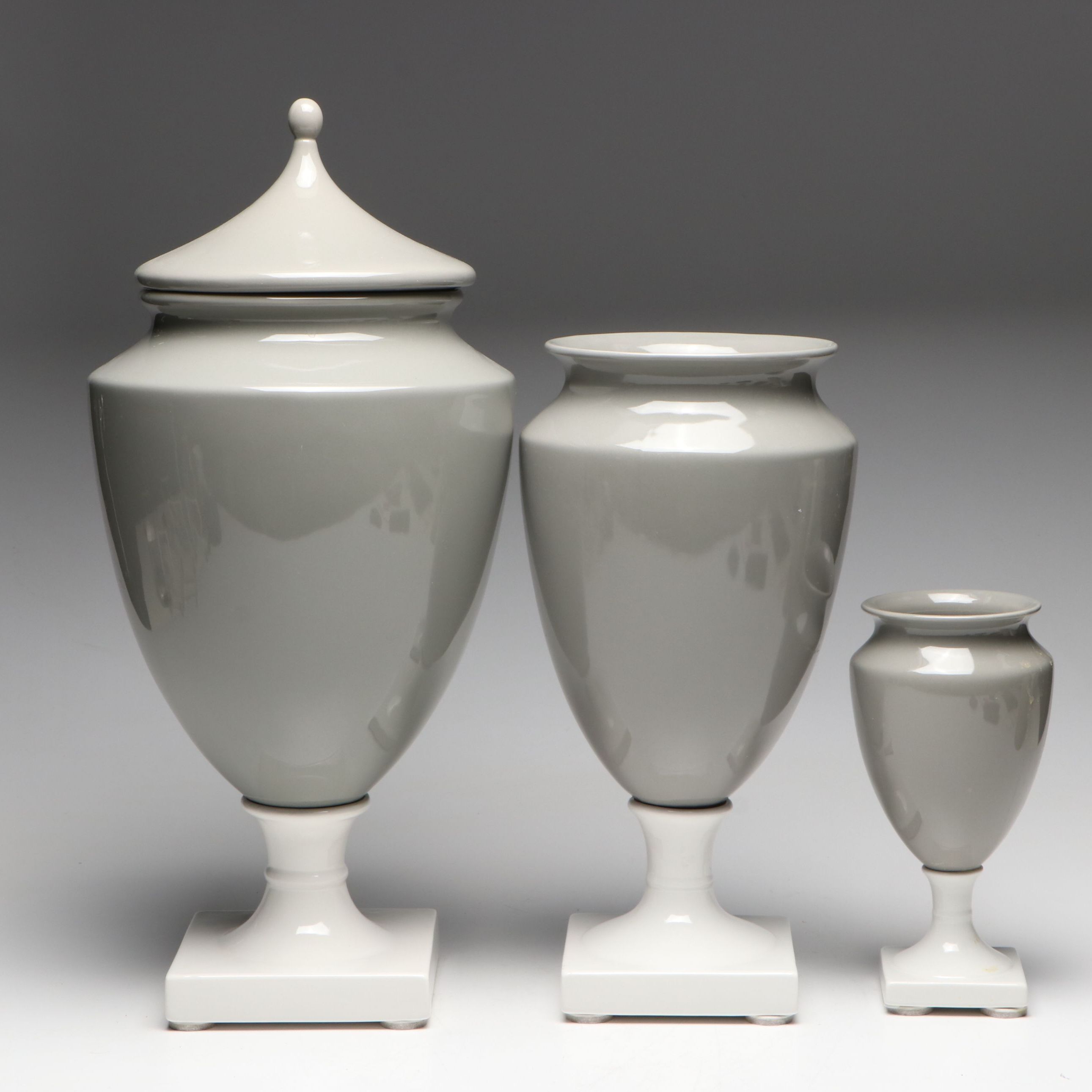 Gray and White Ceramic Urn and Vases
