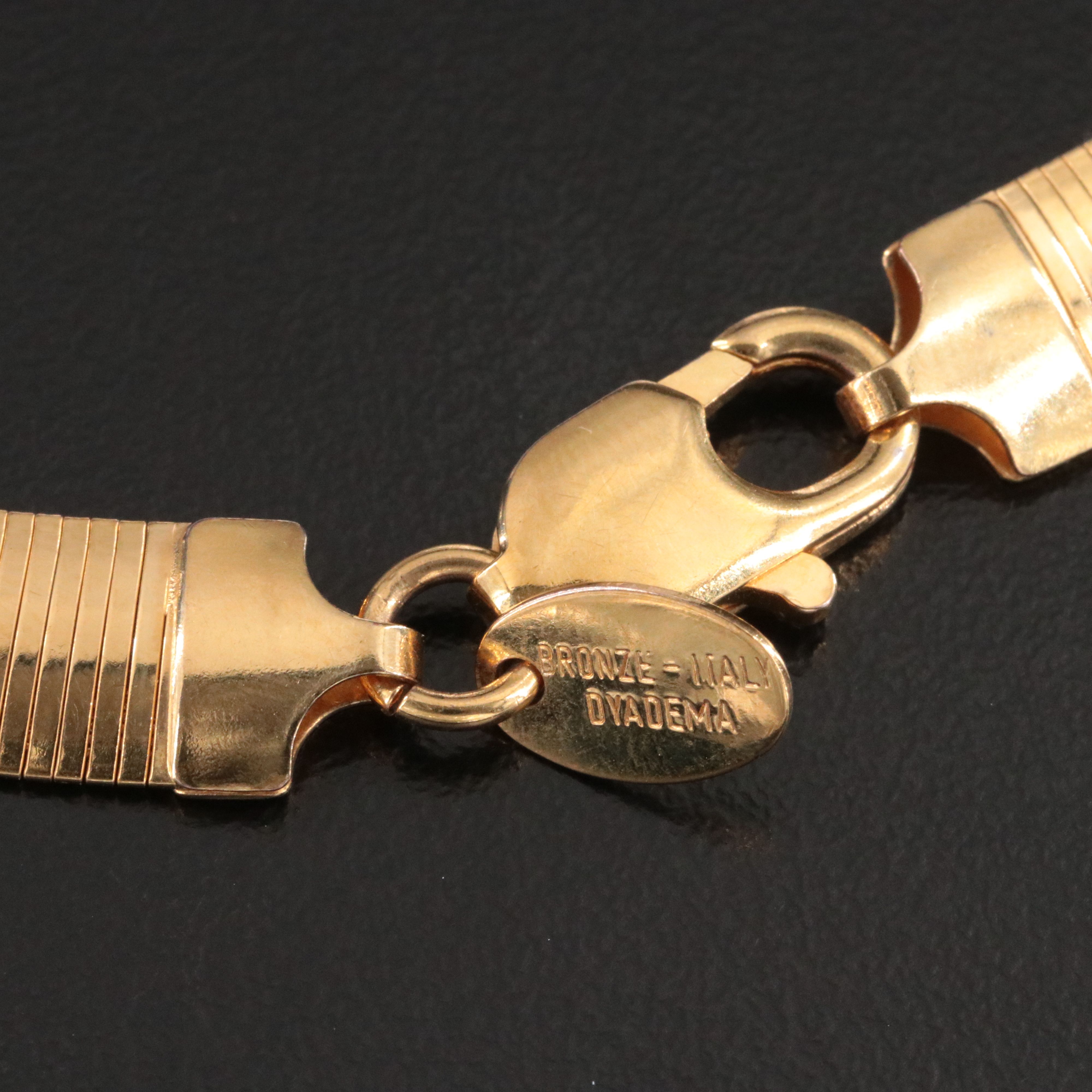 Dyadema Bronze Omega Chain Necklaces with Diamond-Cut Designs