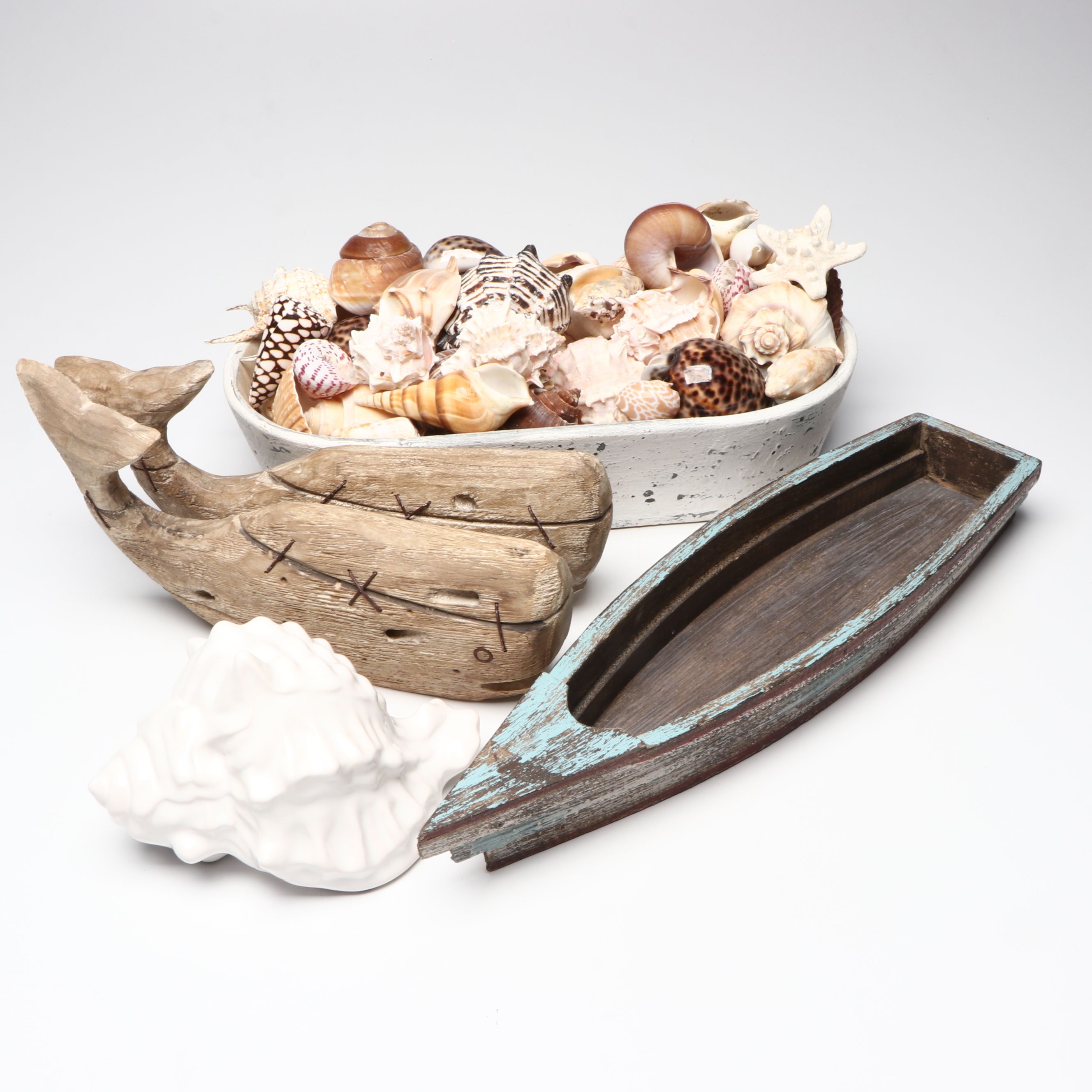 Conch, Cowrie and More Shells with Wooden Whales and More Nautical Décor