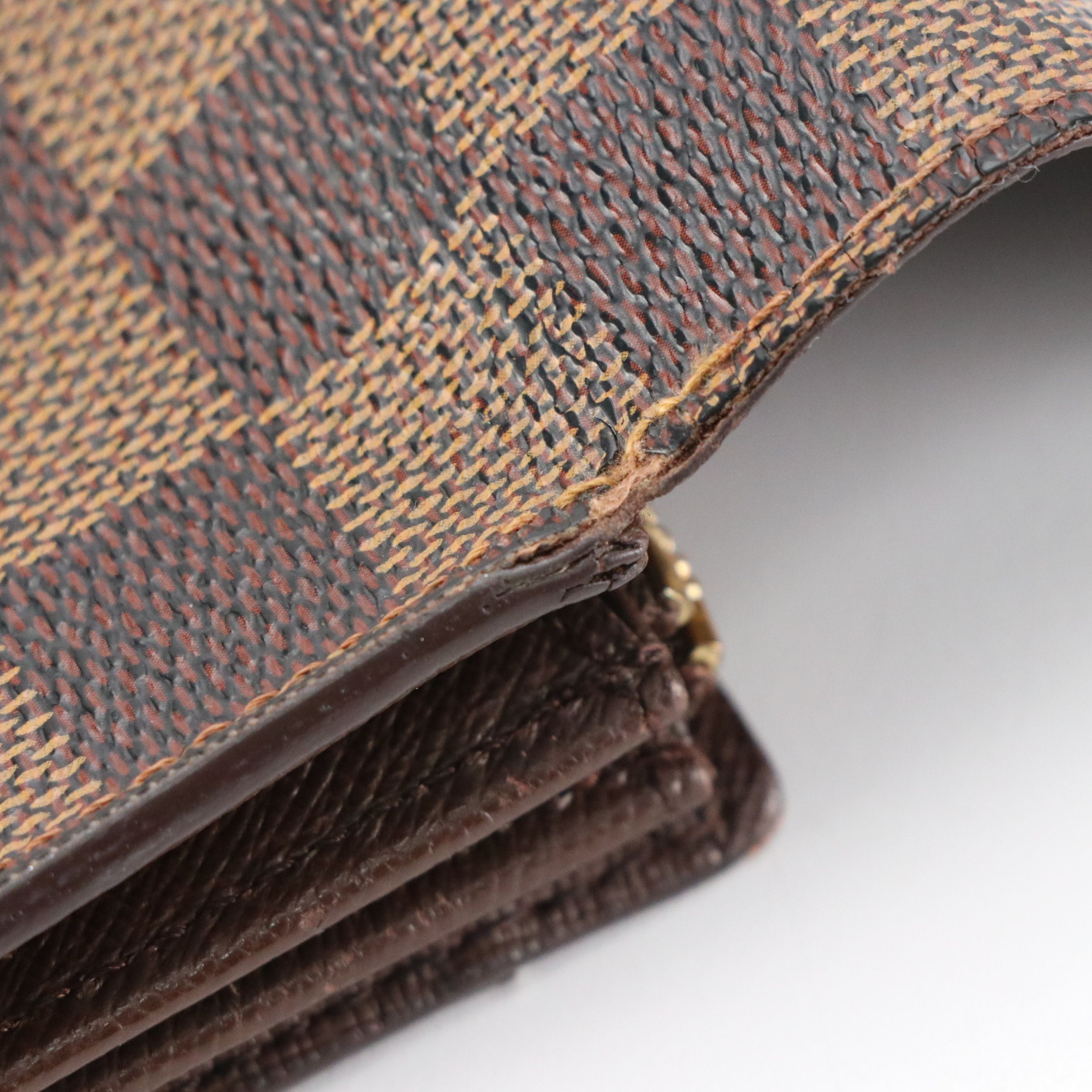 Louis Vuitton Sarah Wallet in Damier Ebene Canvas