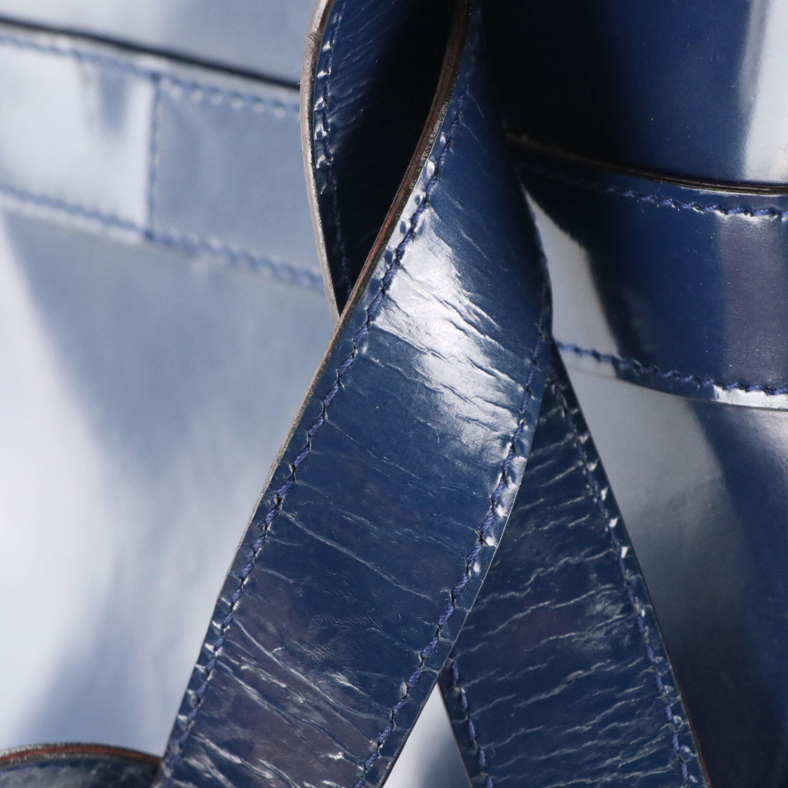 Salvatore Ferragamo Double Gancini Lock Bucket Bag in Blue Patent Leather