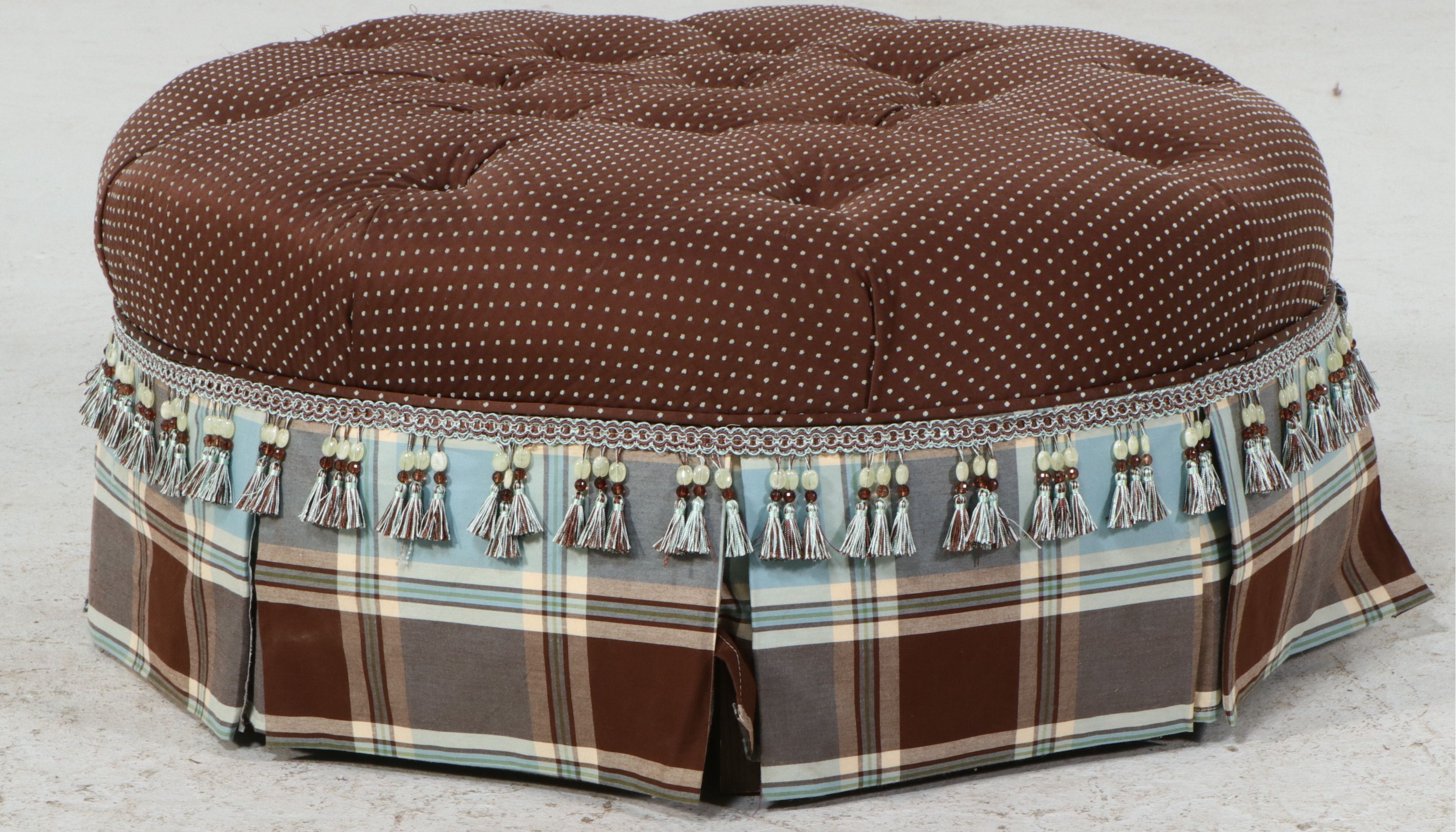 Contemporary Tufted Upholstered Round Ottoman with Plaid Skirt