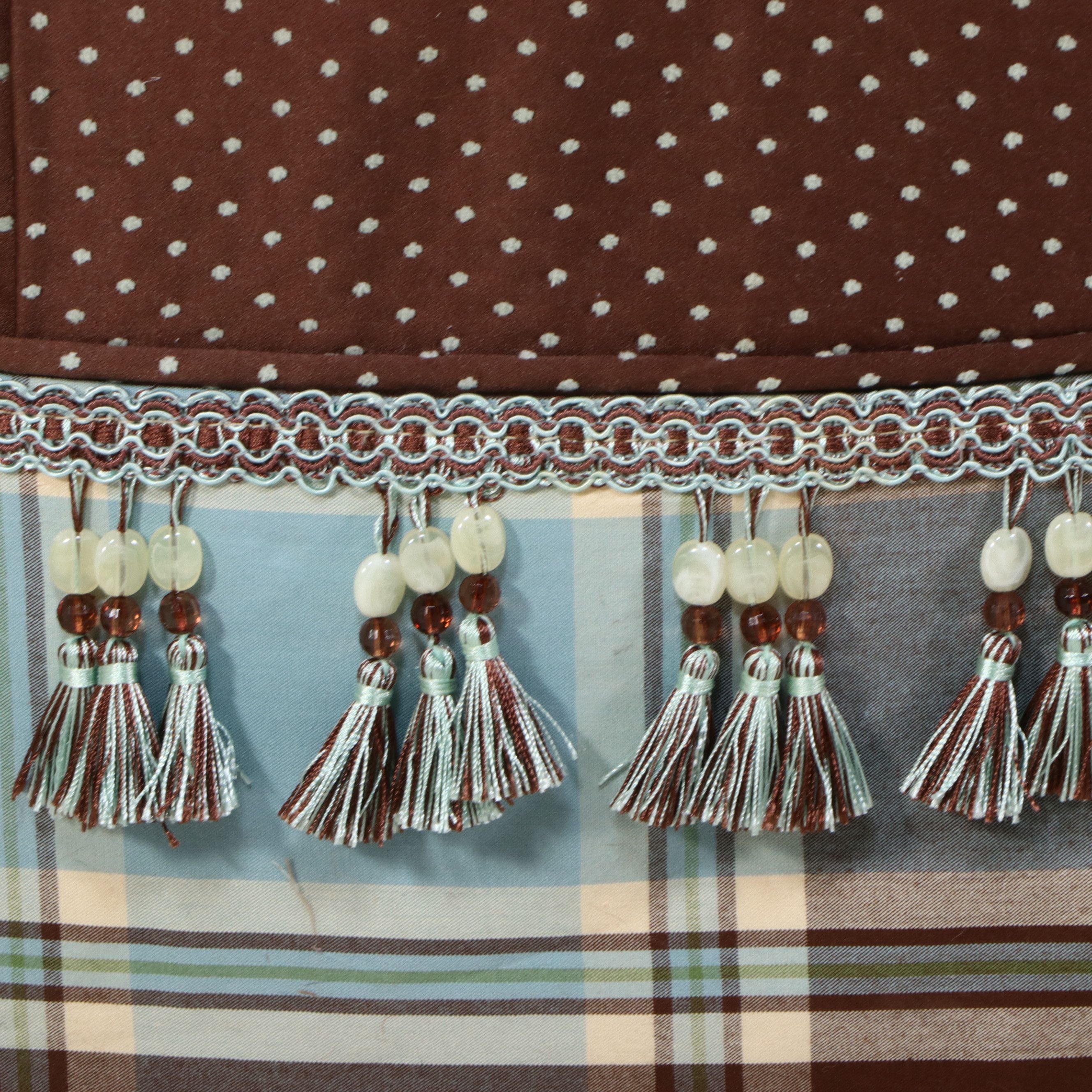 Contemporary Tufted Upholstered Round Ottoman with Plaid Skirt