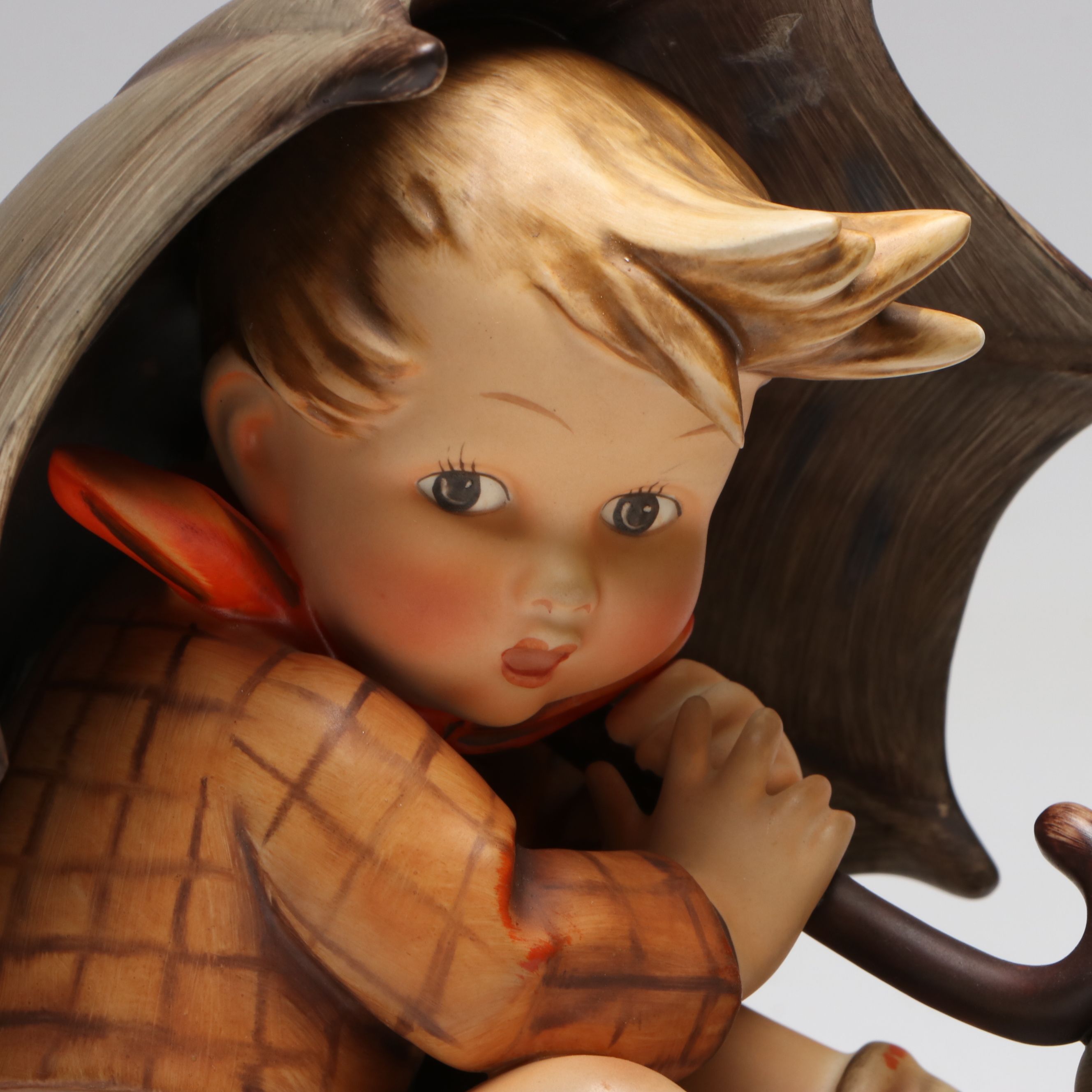 Goebel "Umbrella Boy" and "Umbrella Girl" Porcelain Hummel Bookends