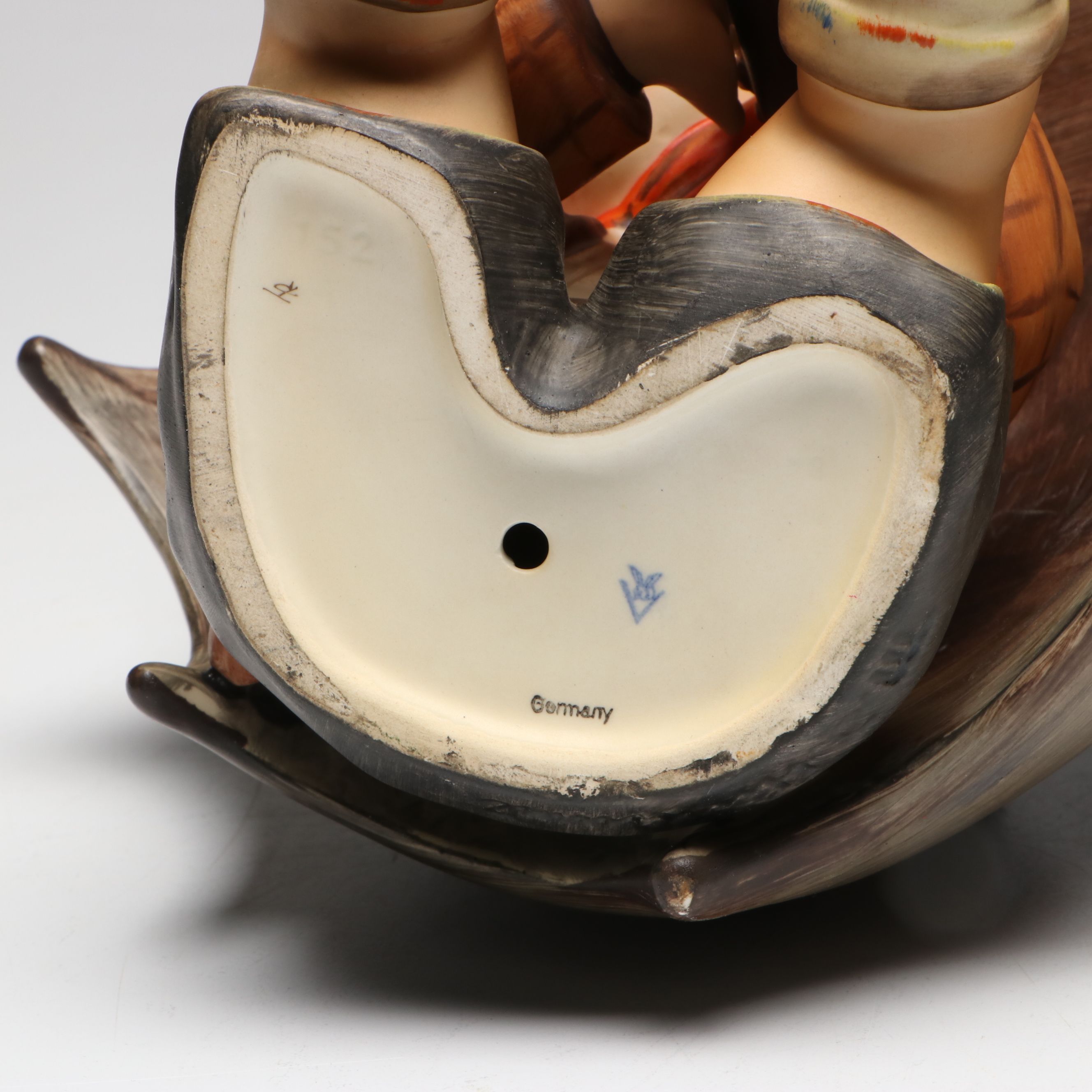 Goebel "Umbrella Boy" and "Umbrella Girl" Porcelain Hummel Bookends