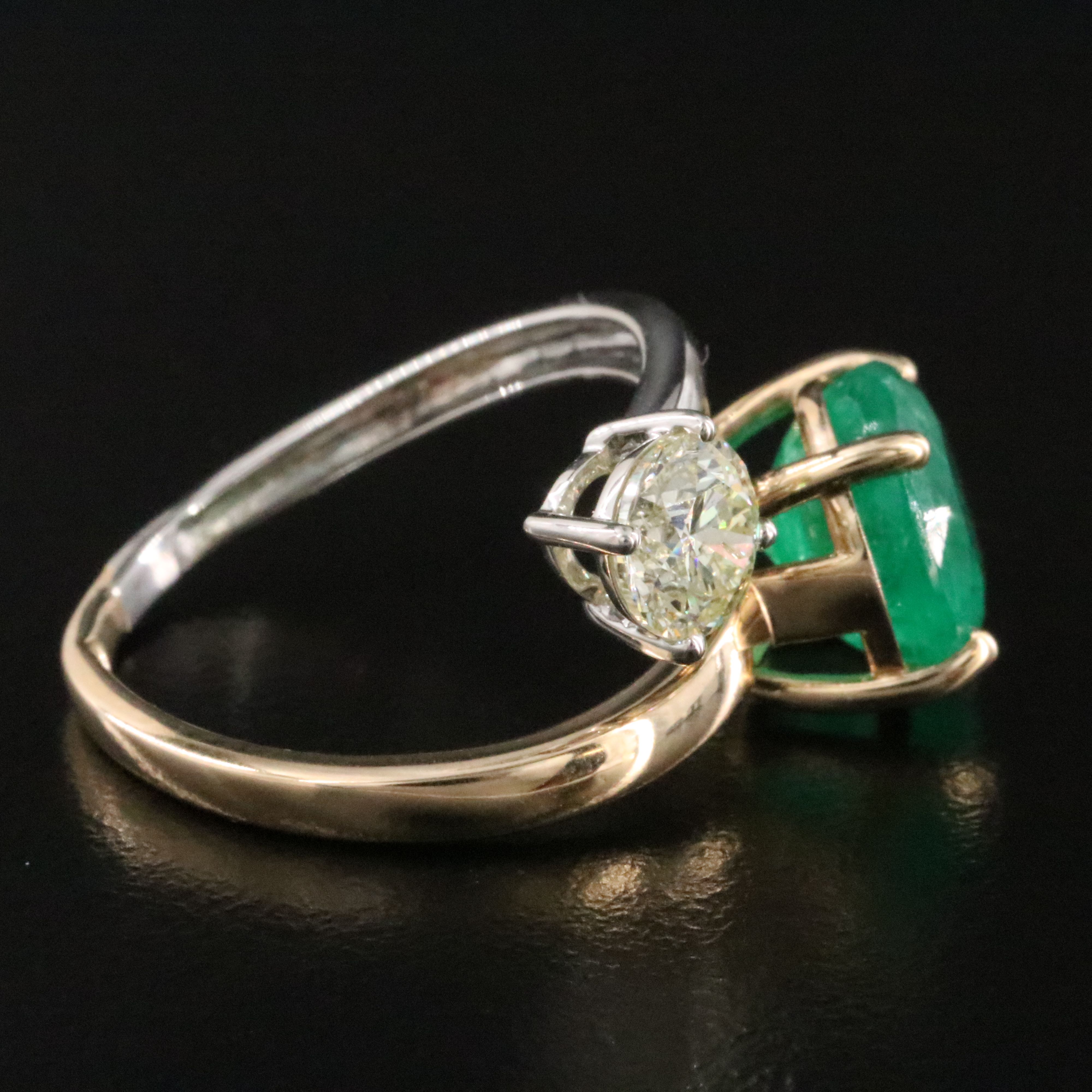 Platinum and 14K 2.97 CT Emerald and Diamond Bypass Ring