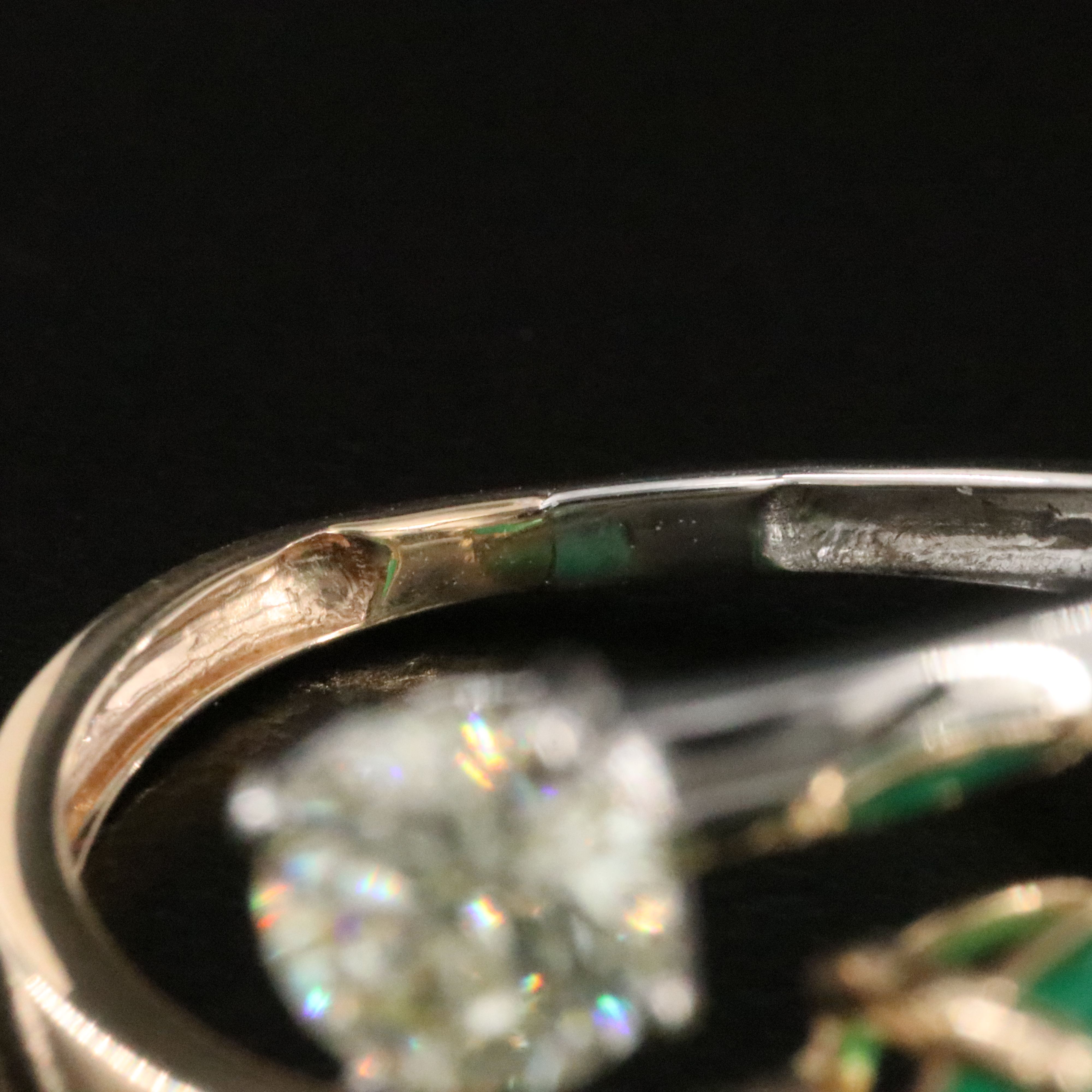 Platinum and 14K 2.97 CT Emerald and Diamond Bypass Ring