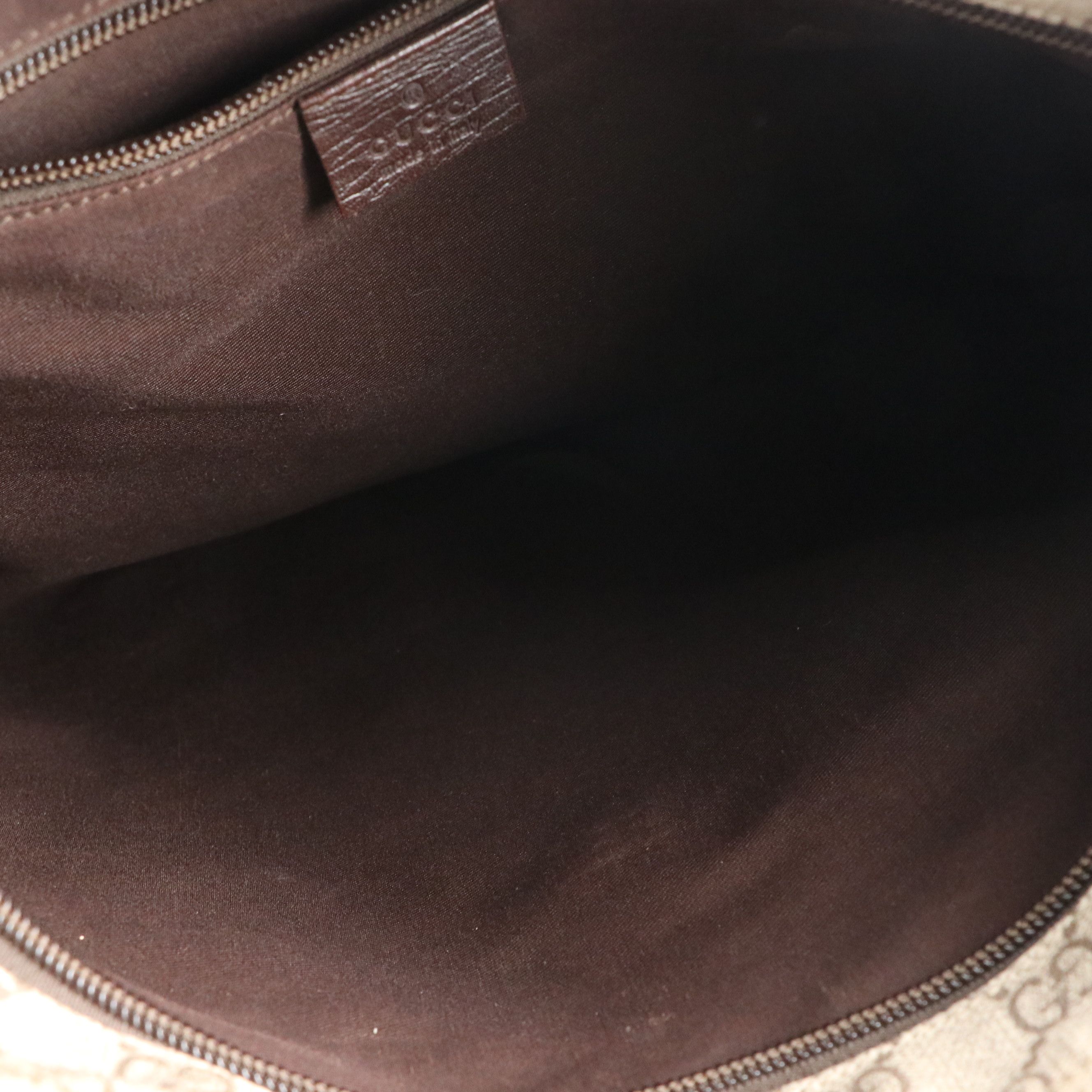 Gucci Zippered Messenger Bag in GG Supreme Canvas and Brown Leather Trim