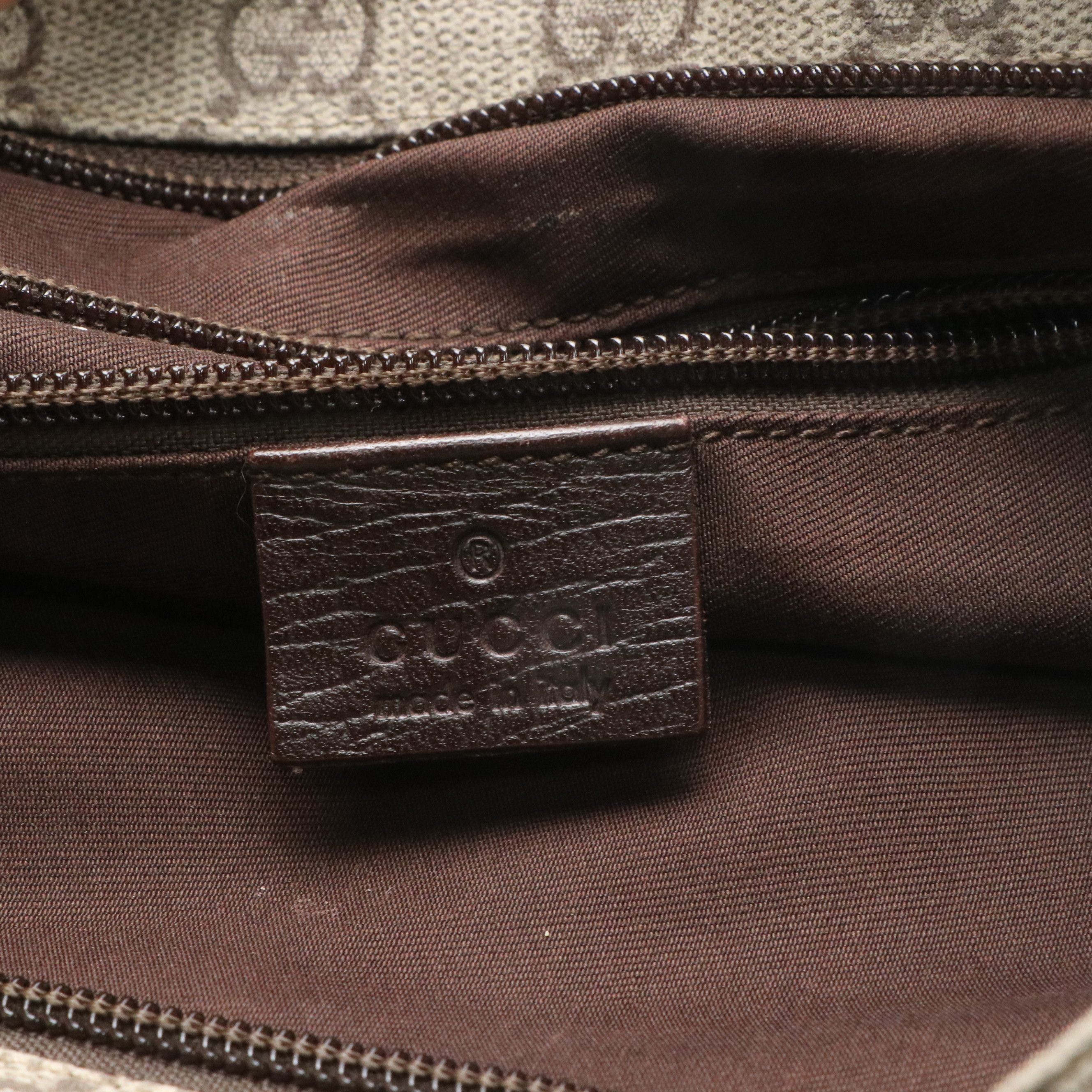 Gucci Zippered Messenger Bag in GG Supreme Canvas and Brown Leather Trim