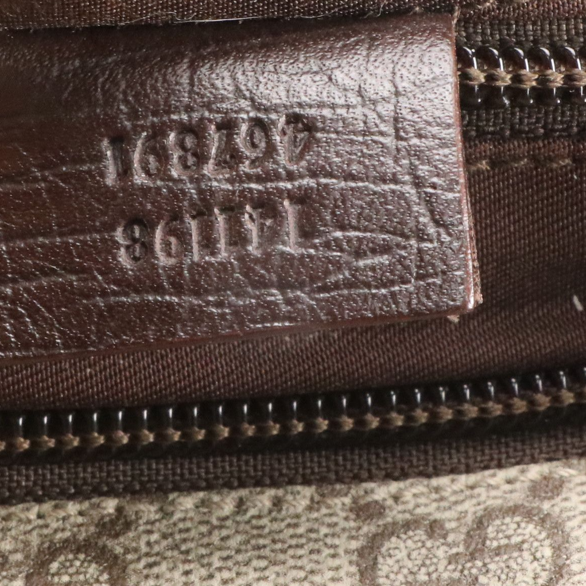 Gucci Zippered Messenger Bag in GG Supreme Canvas and Brown Leather Trim