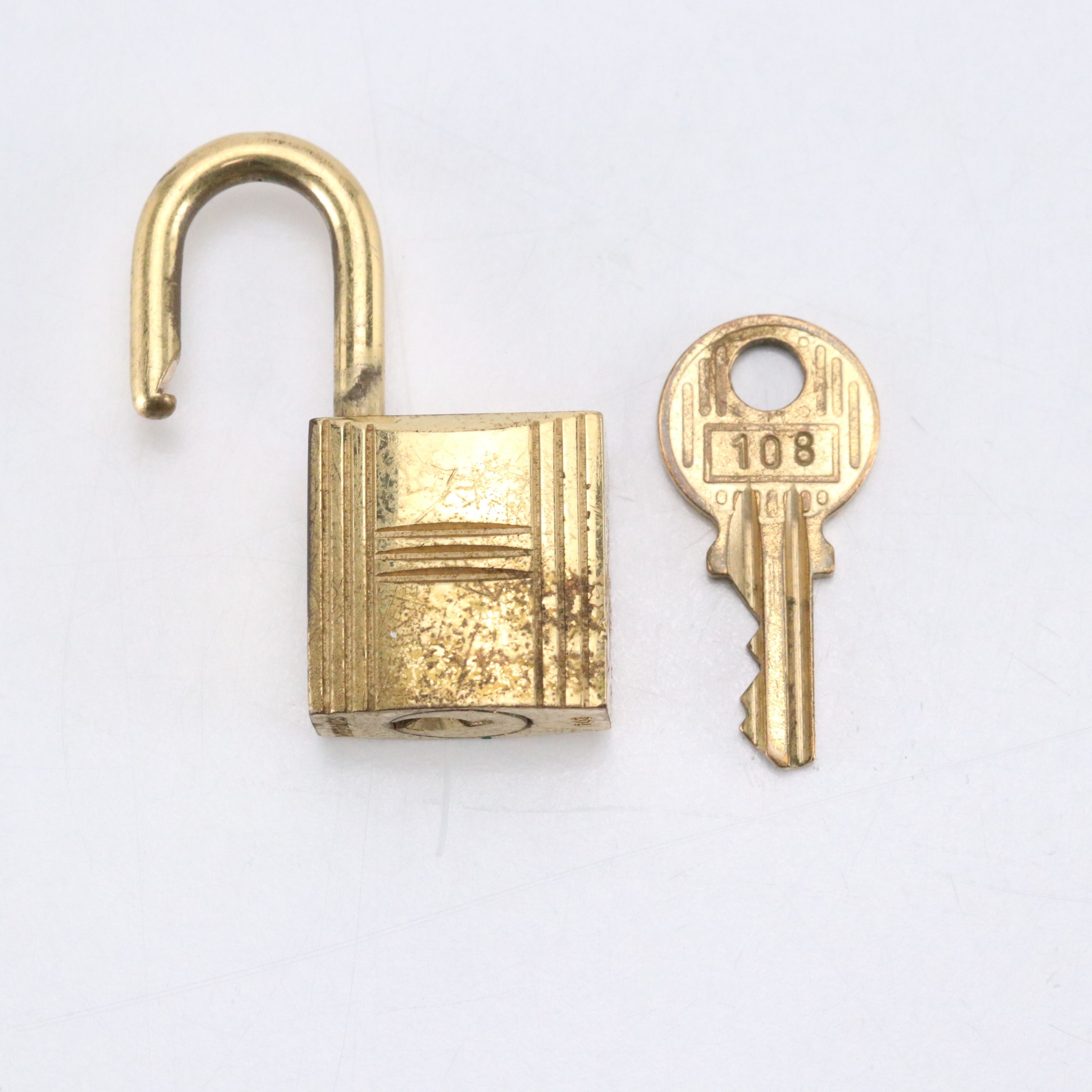 Hermès Gold Tone Padlock and Key