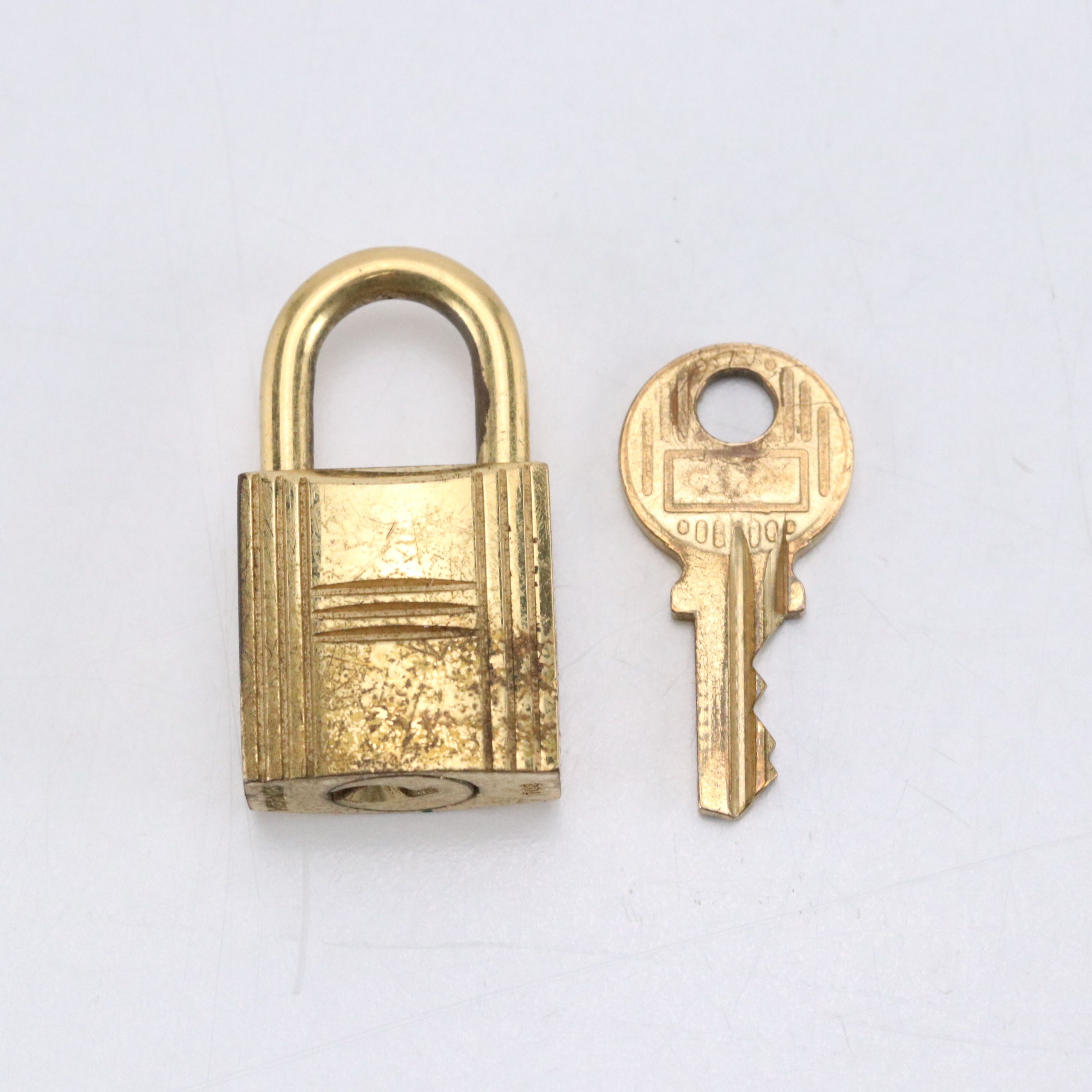 Hermès Gold Tone Padlock and Key