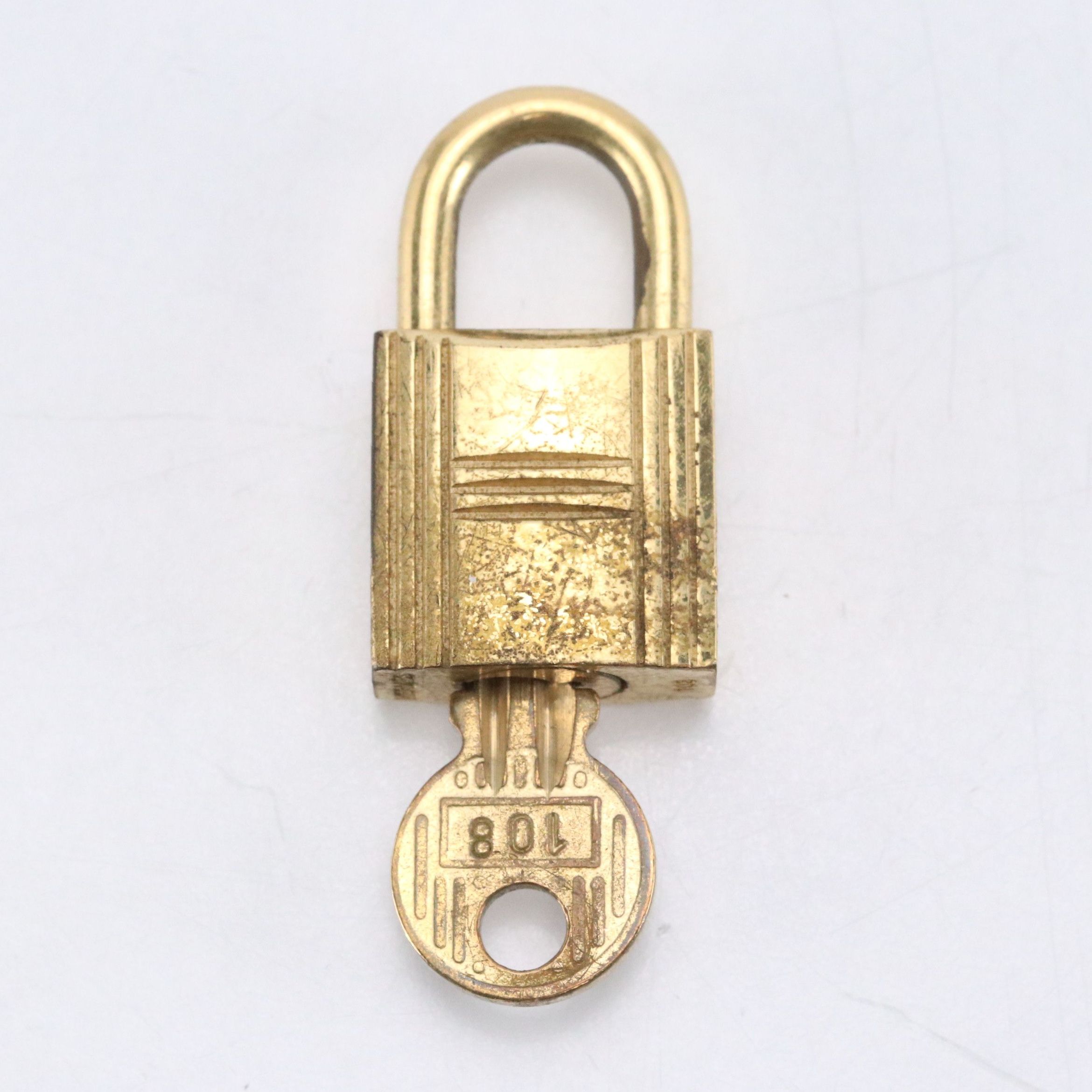 Hermès Gold Tone Padlock and Key
