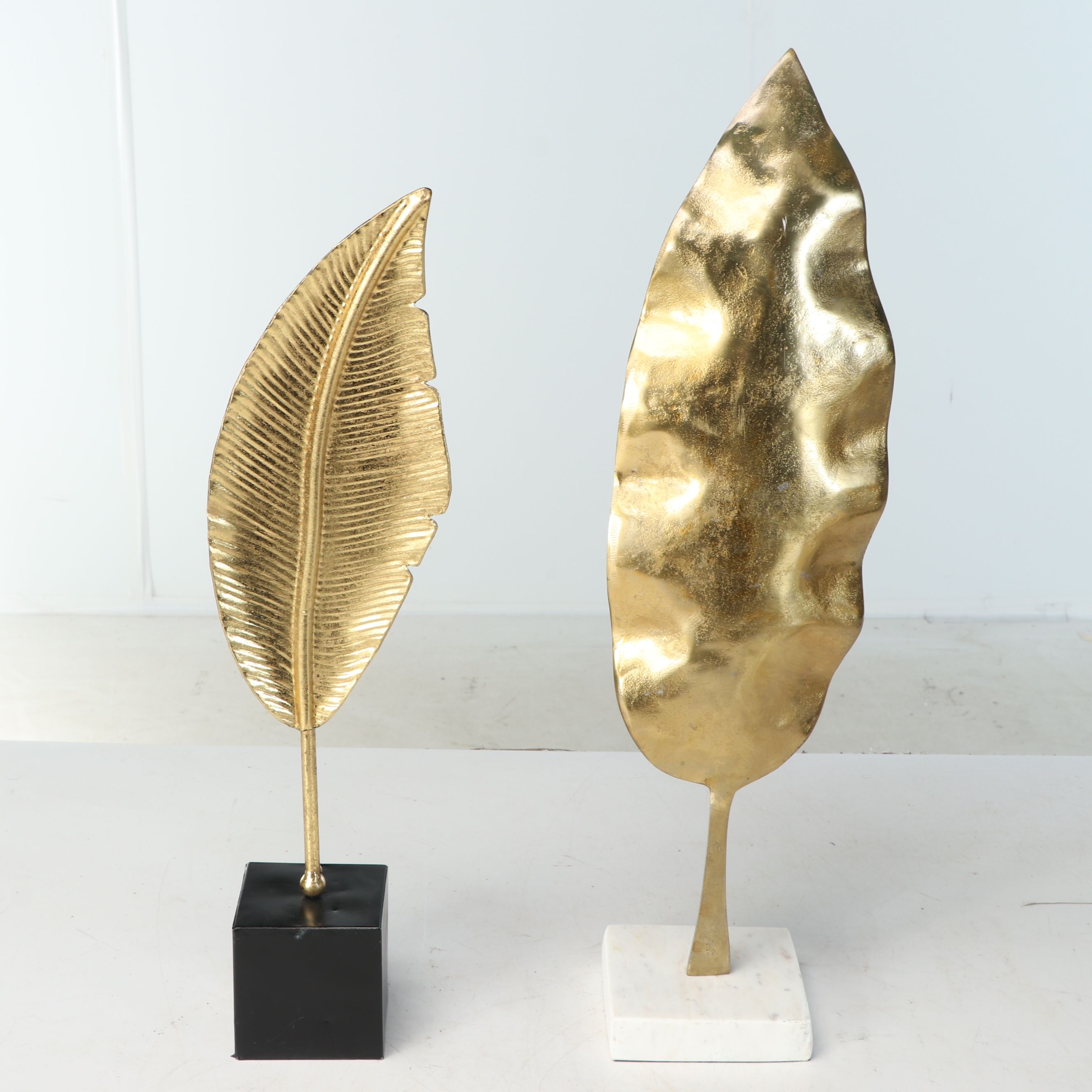 Brass Finish Lanterns with Sculptural Metal Leaves and More Décor