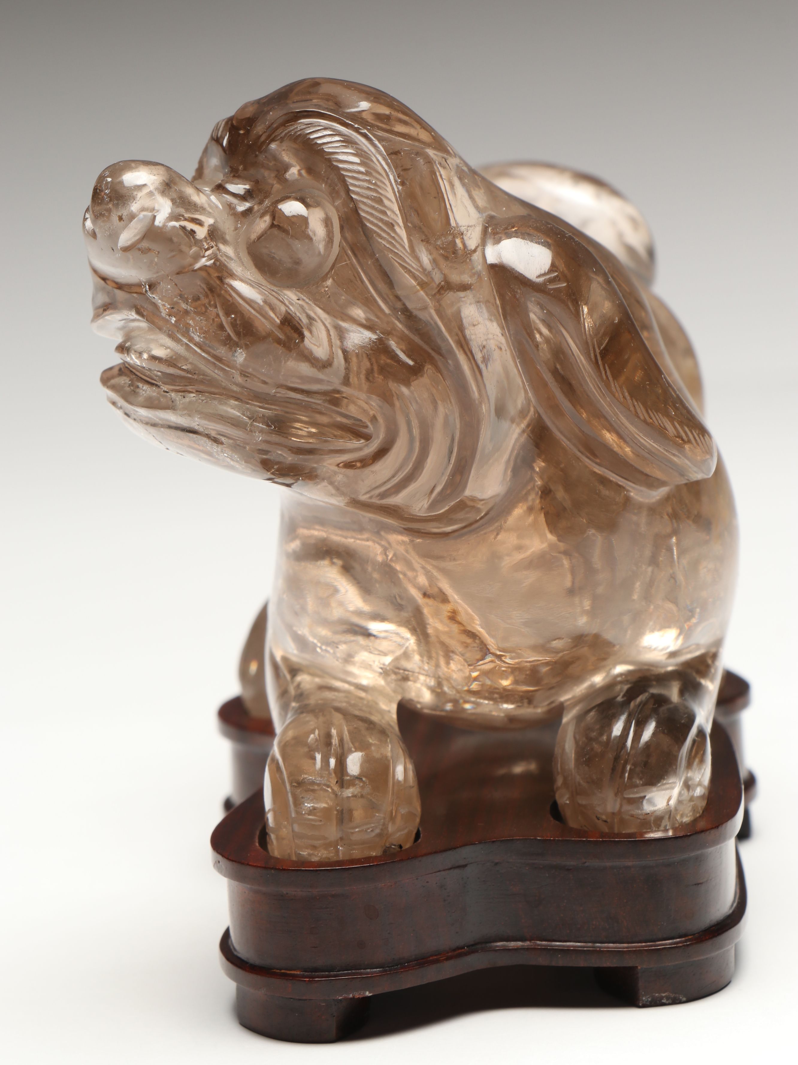 Chinese Guardian Lion Rock Crystal Figure on Wood Base