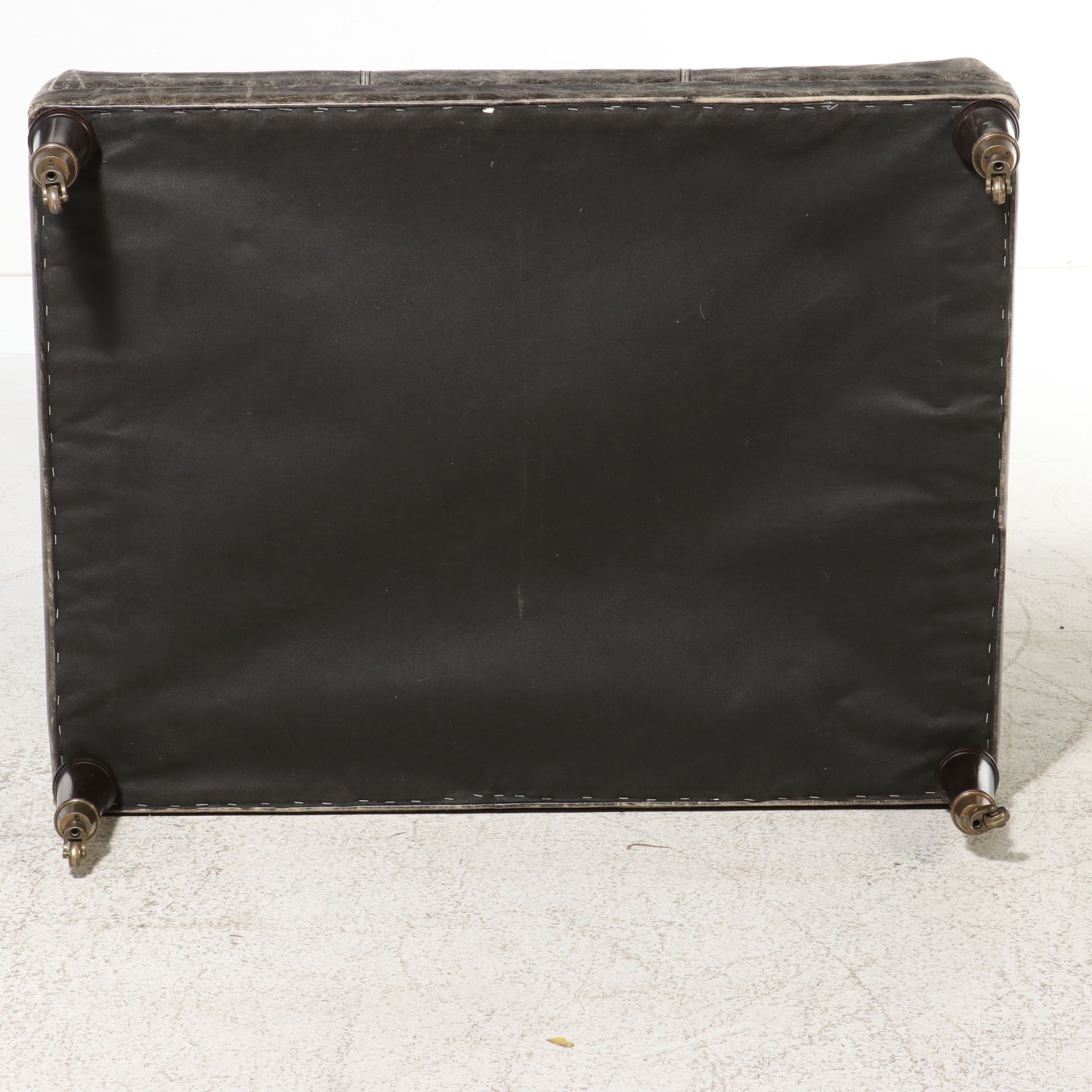 Contemporary Edwardian Style Distressed Leather Cocktail Ottoman on Casters