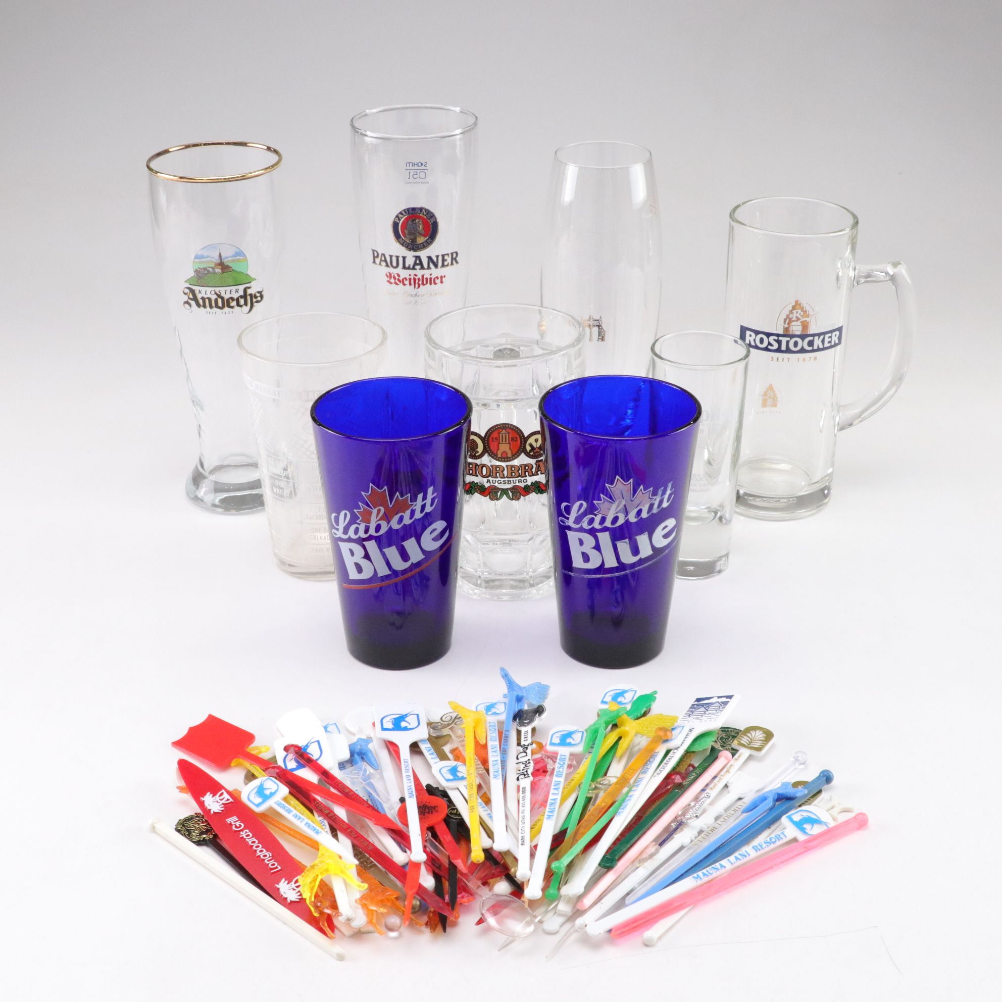 Pilsner Urquell Goblet with Mixing Sticks and Other Beer, Lager, & Ale Glasses