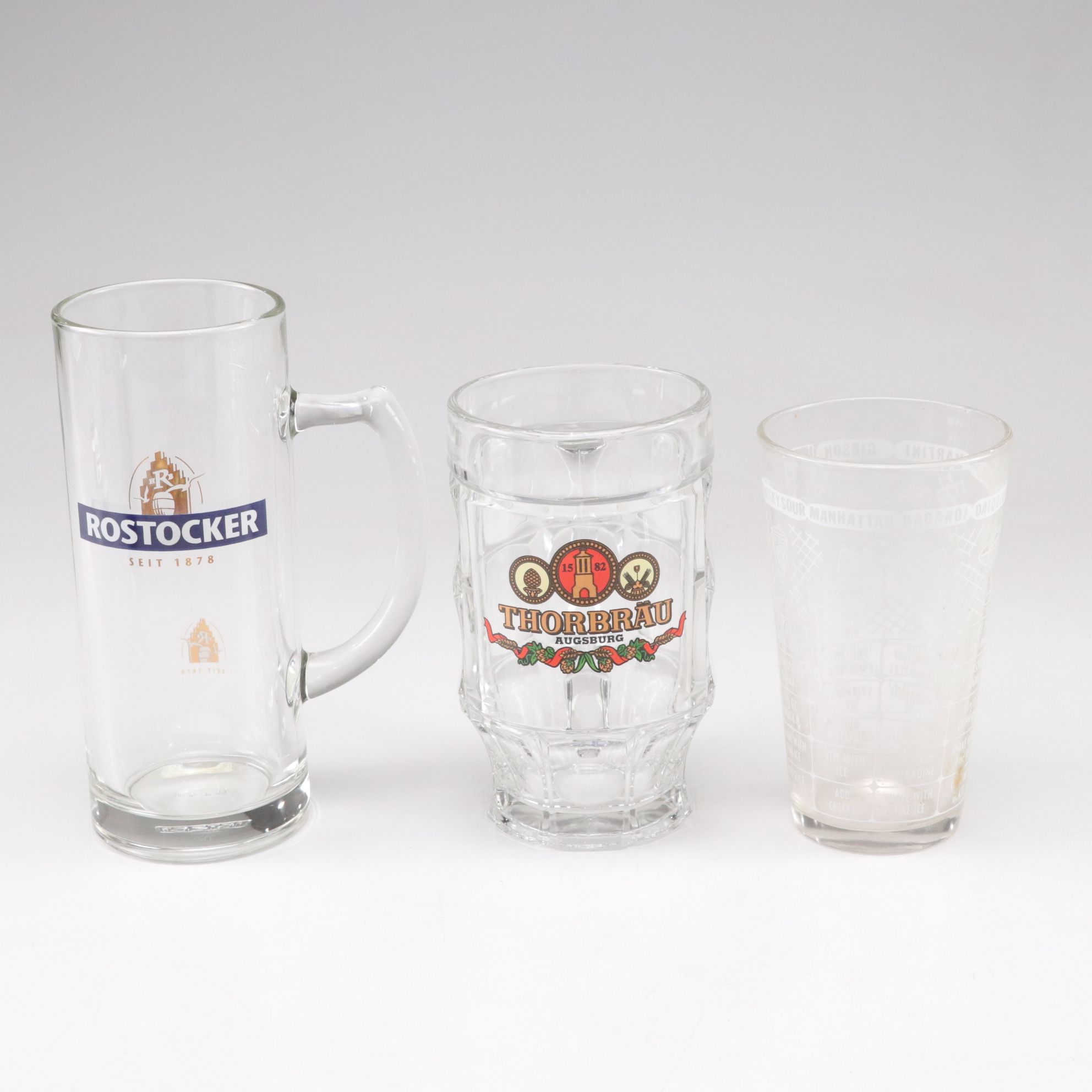 Pilsner Urquell Goblet with Mixing Sticks and Other Beer, Lager, & Ale Glasses