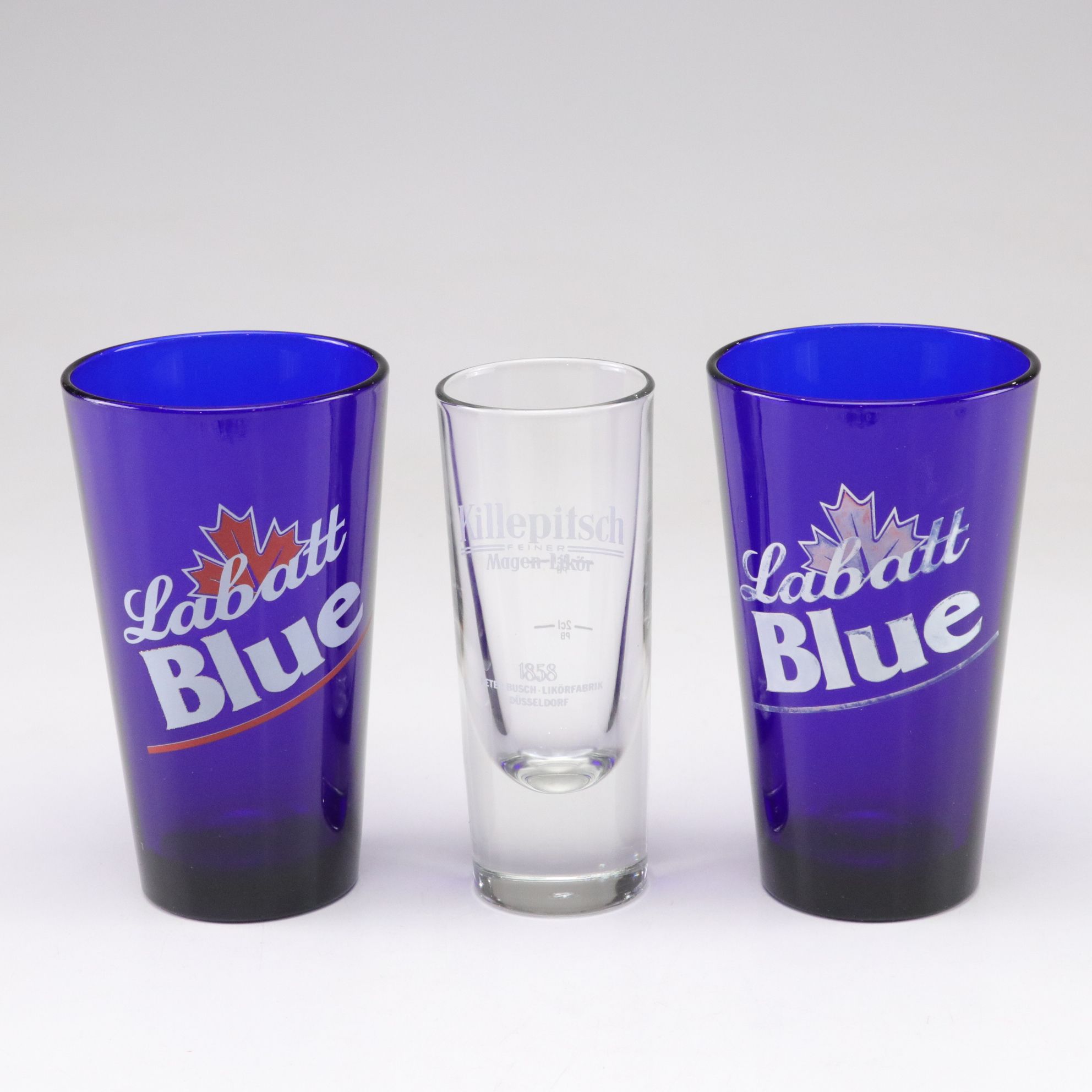 Pilsner Urquell Goblet with Mixing Sticks and Other Beer, Lager, & Ale Glasses