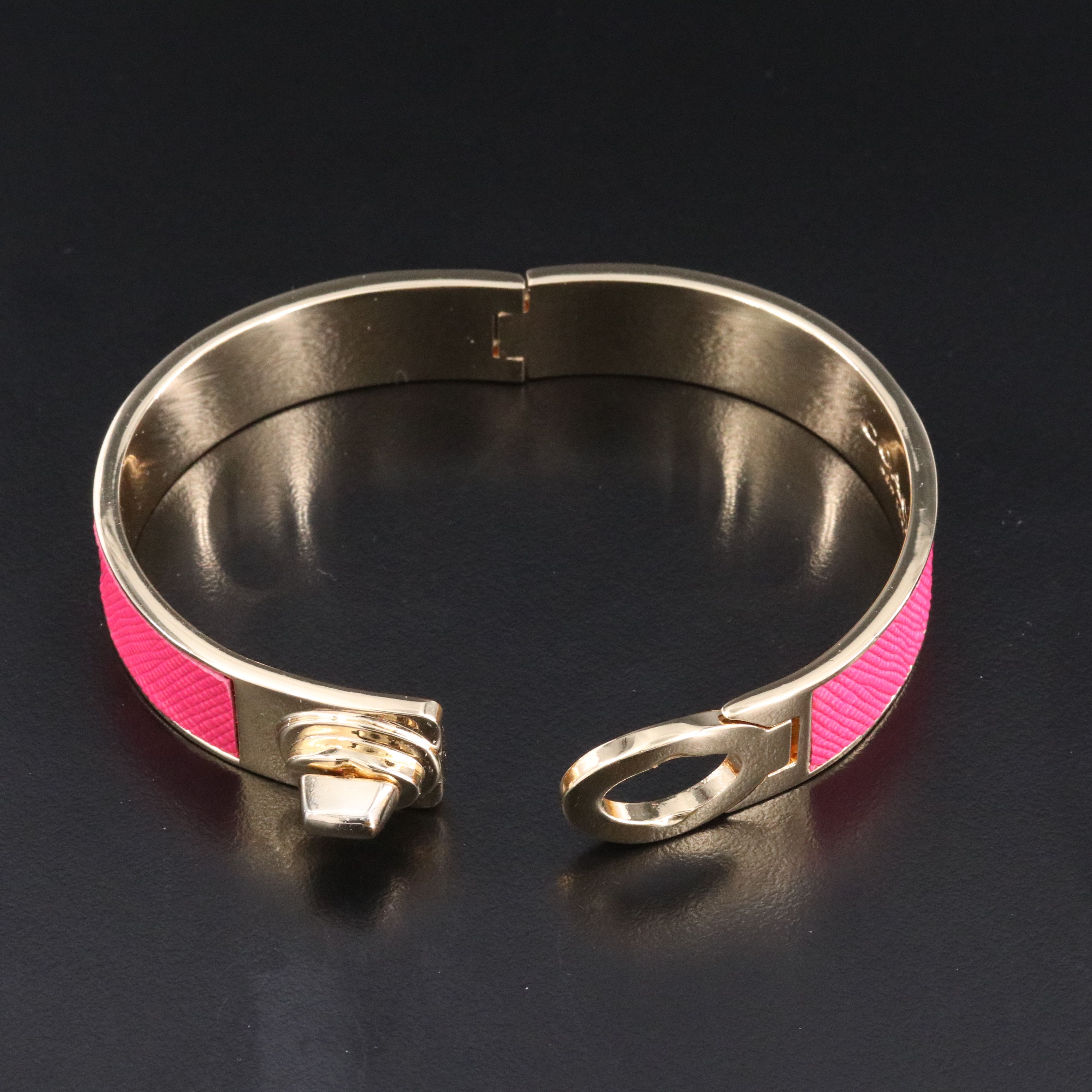 Coach textured pink latch bracelet