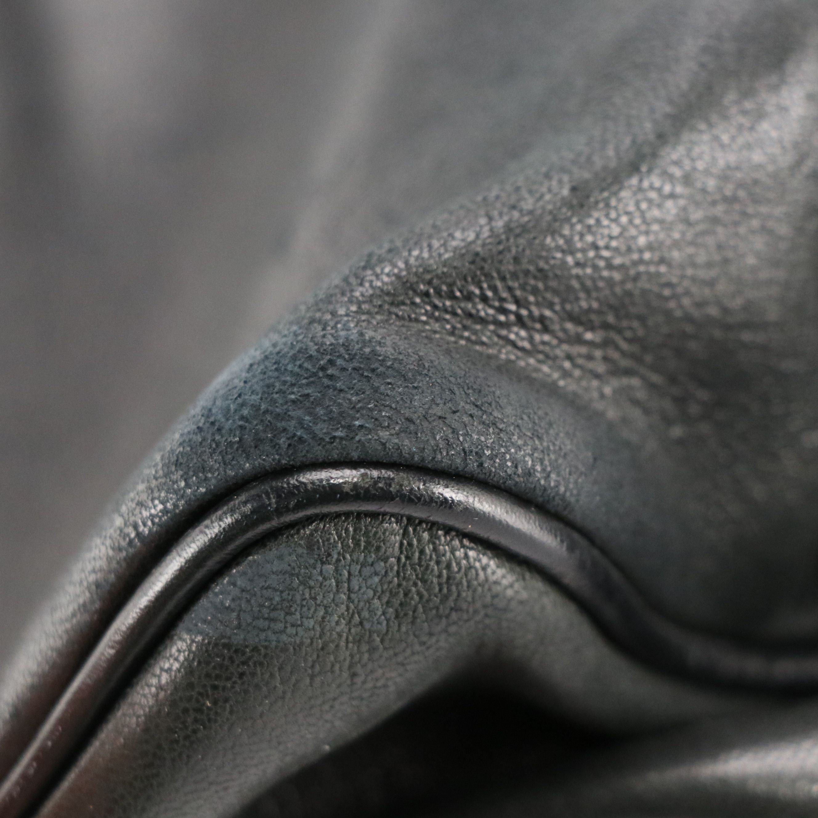 Prada Zippered Shoulder Bag in Black Lambskin Leather