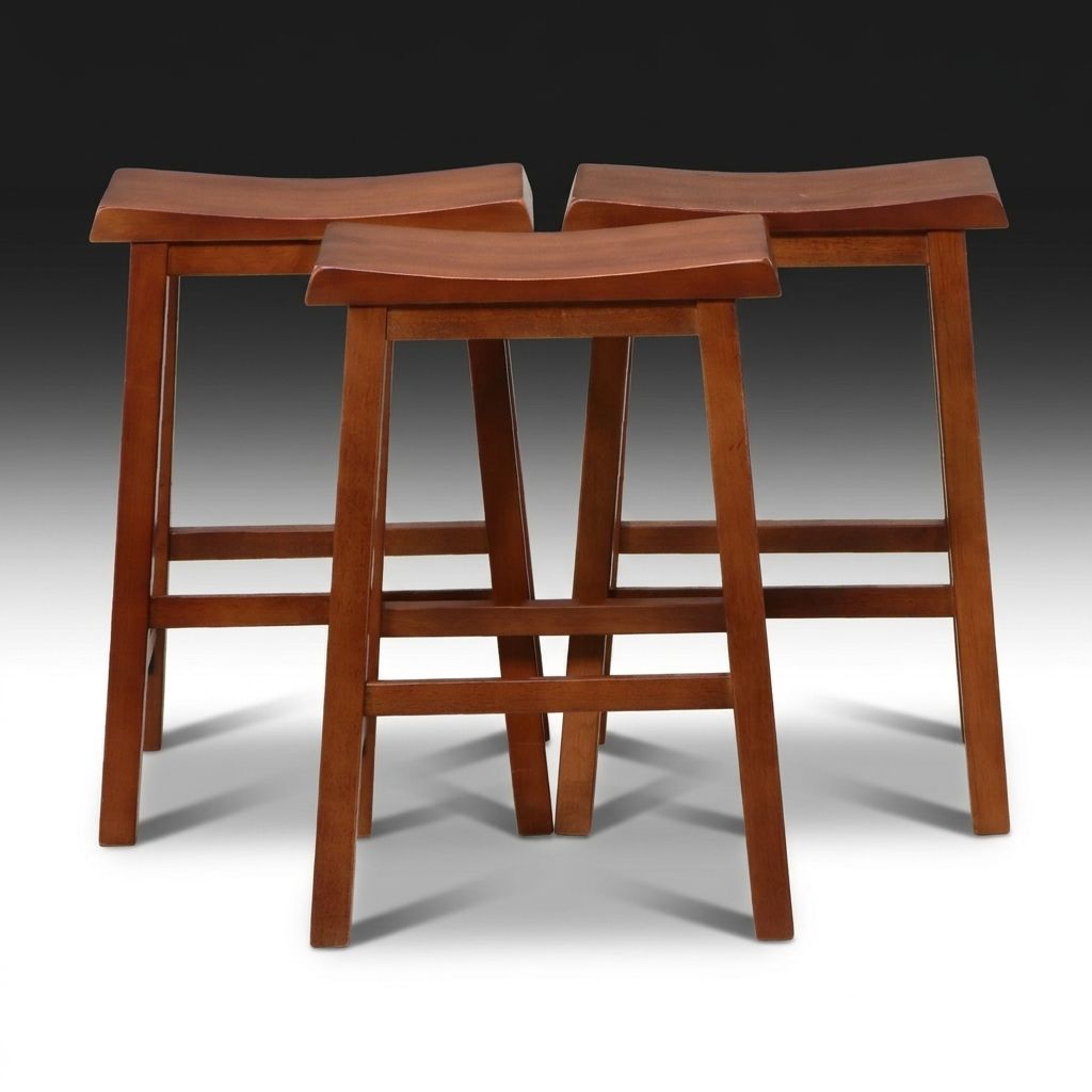 Set of Three Saddle-Seat Stools